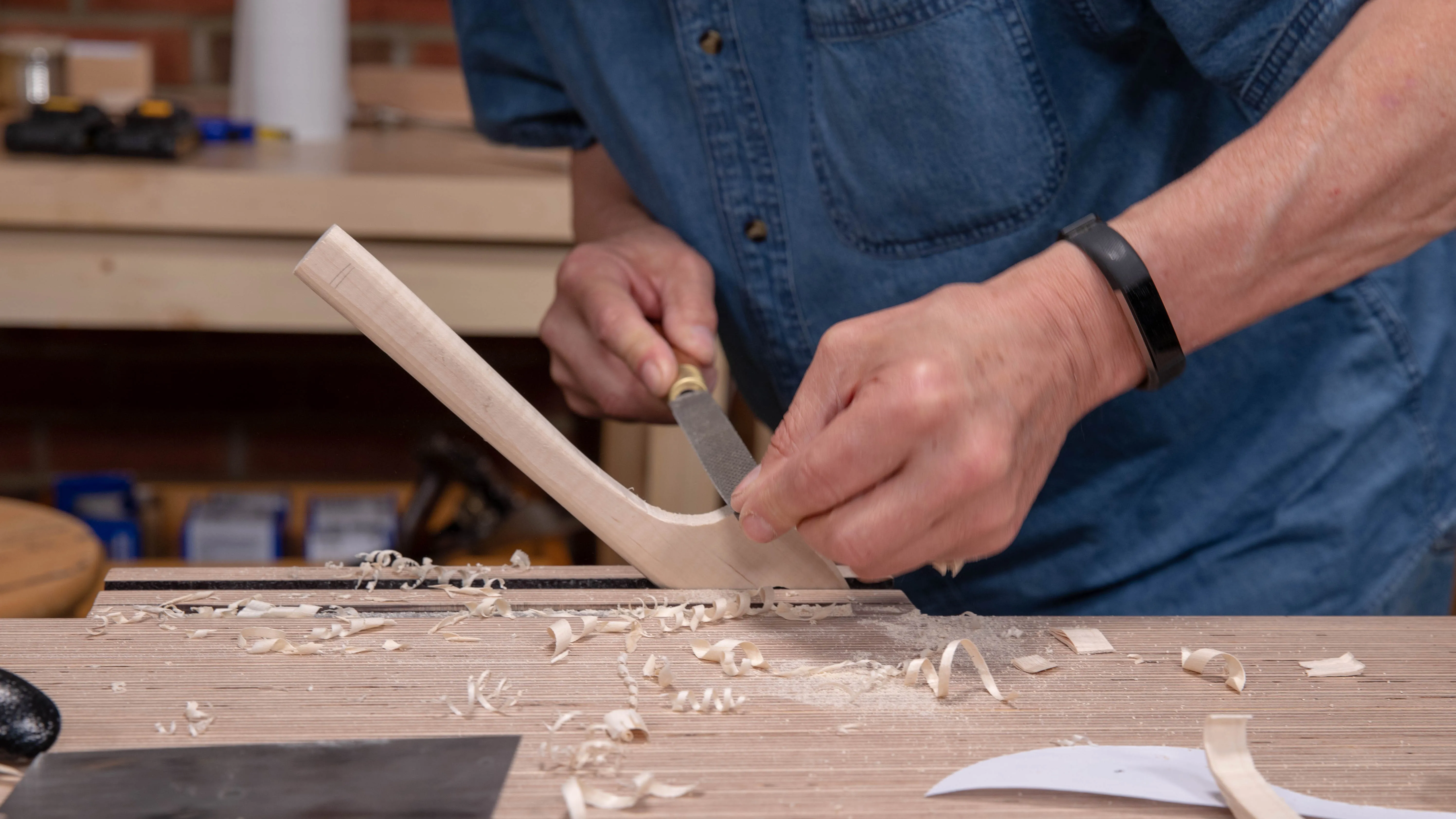 Use a round rasp for the tight internal curve, working from both sides to avoid any splitting on the outside