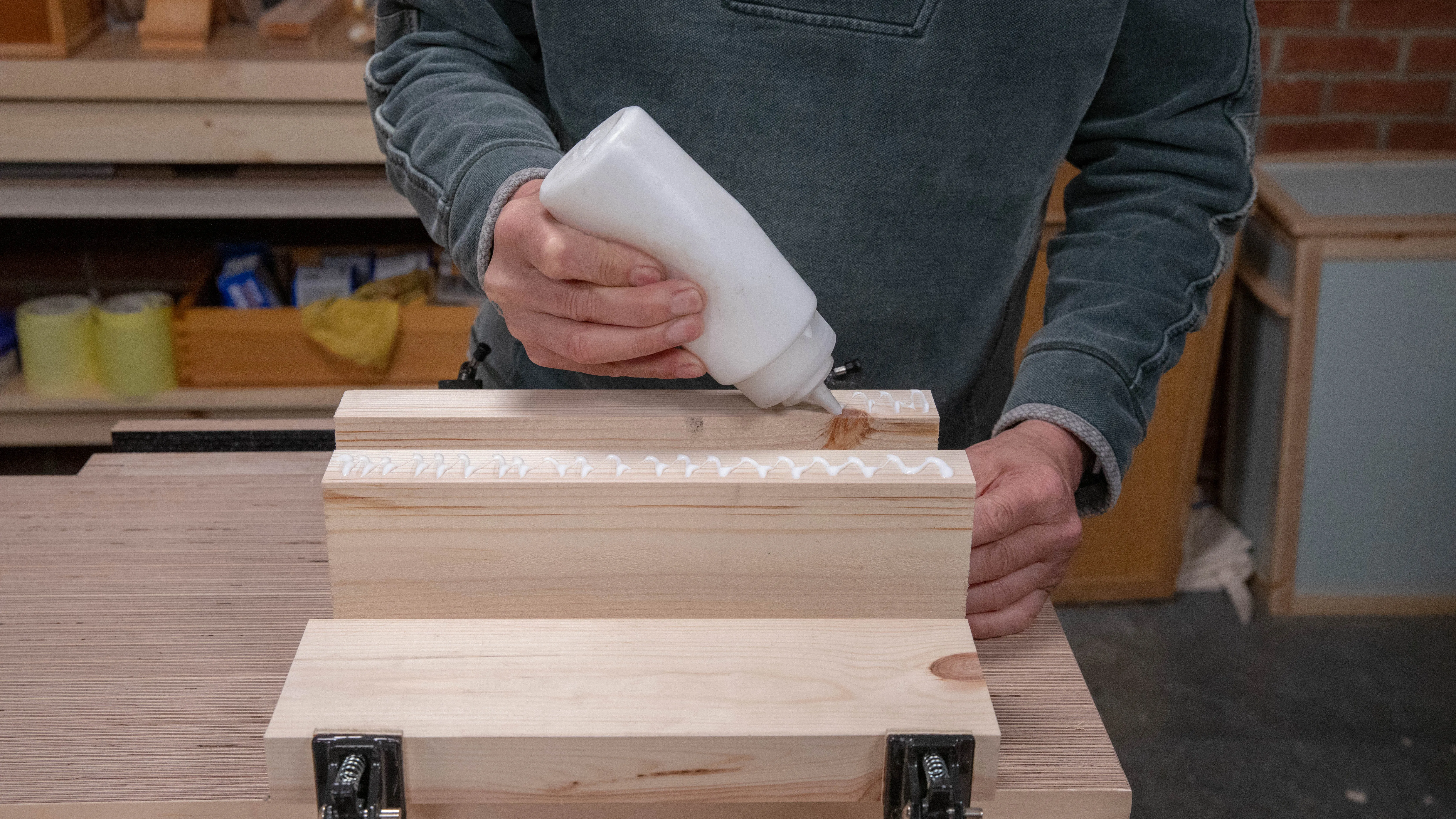 Apply a moderate amount of glue on one edge of each joint line (not both)