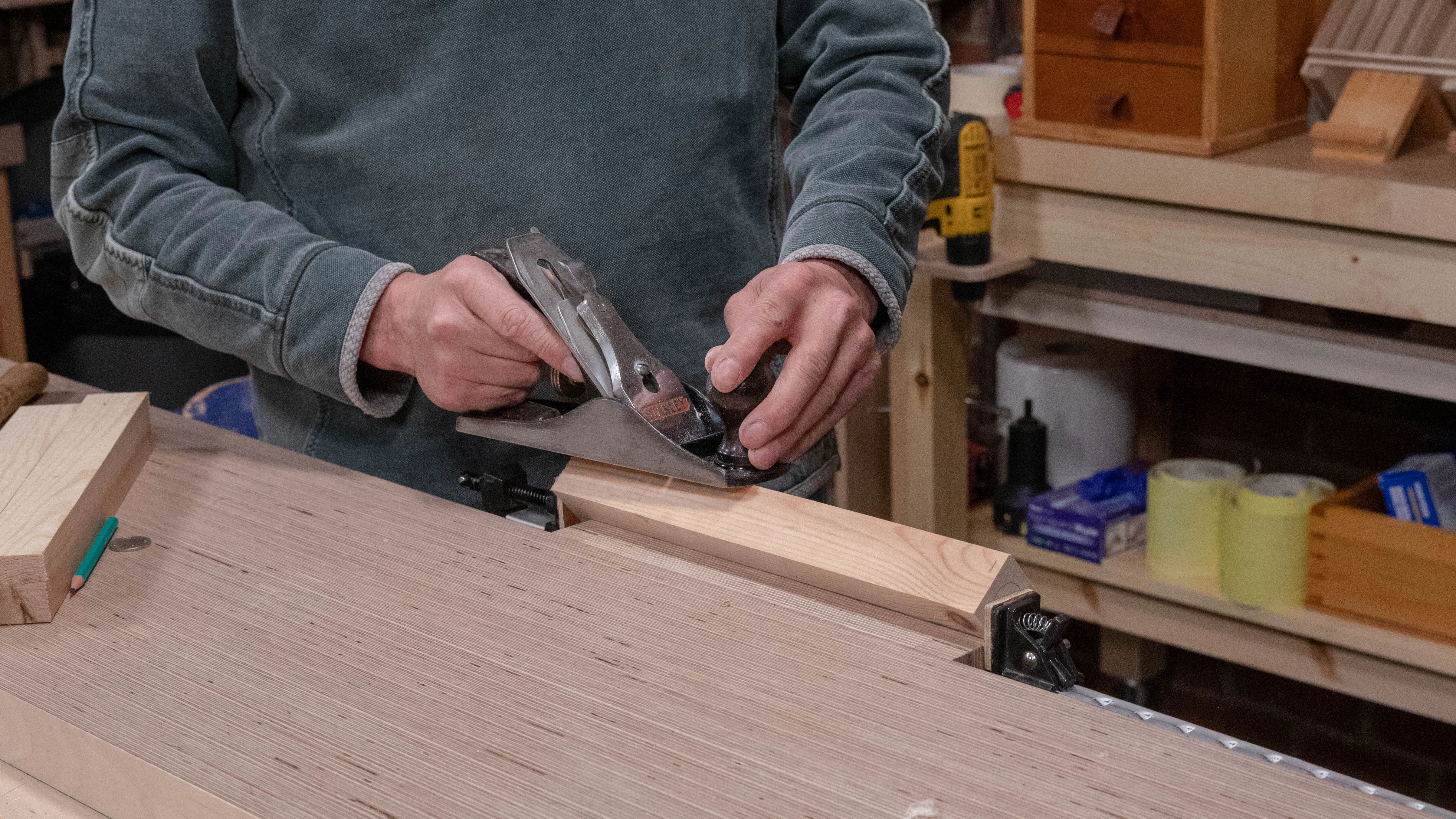 Ensure your work is secure and start to take down the corners towards the pencil line