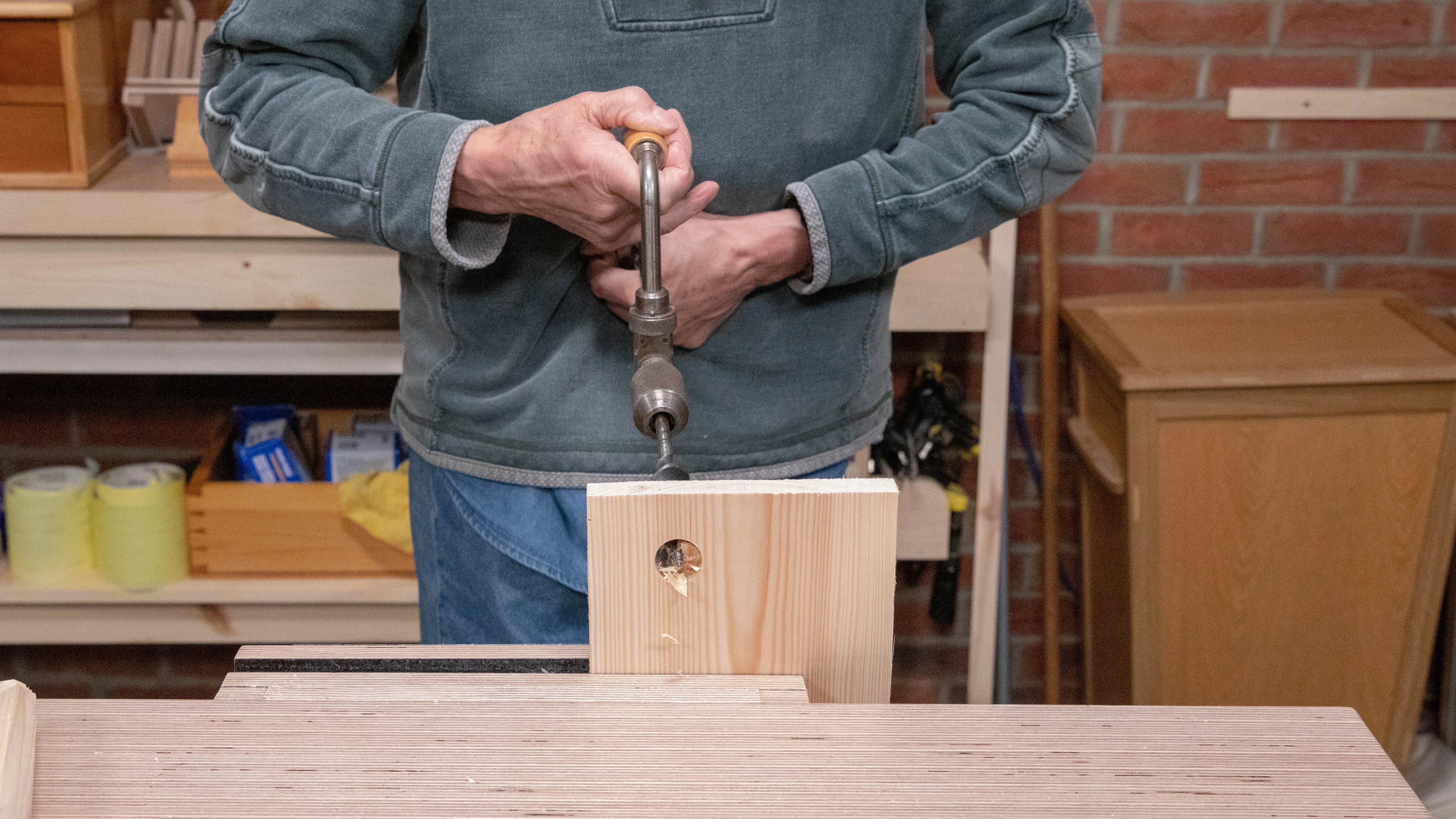 Bore a 1" (25mm) hole on a board to use as a reference for 'fitting' the legs