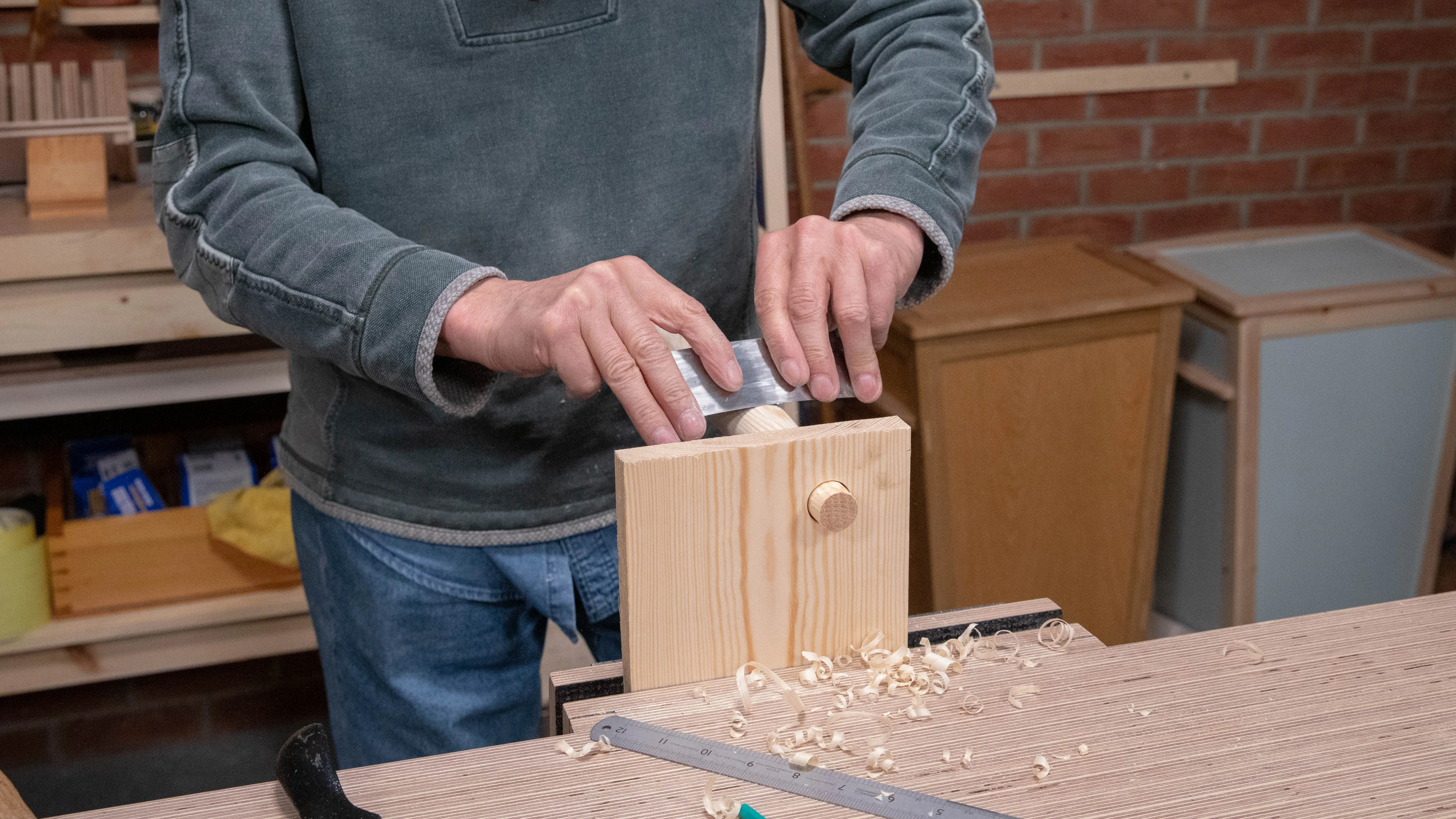 Thin scrapers work very well on round components as you can bend them substantially to shape