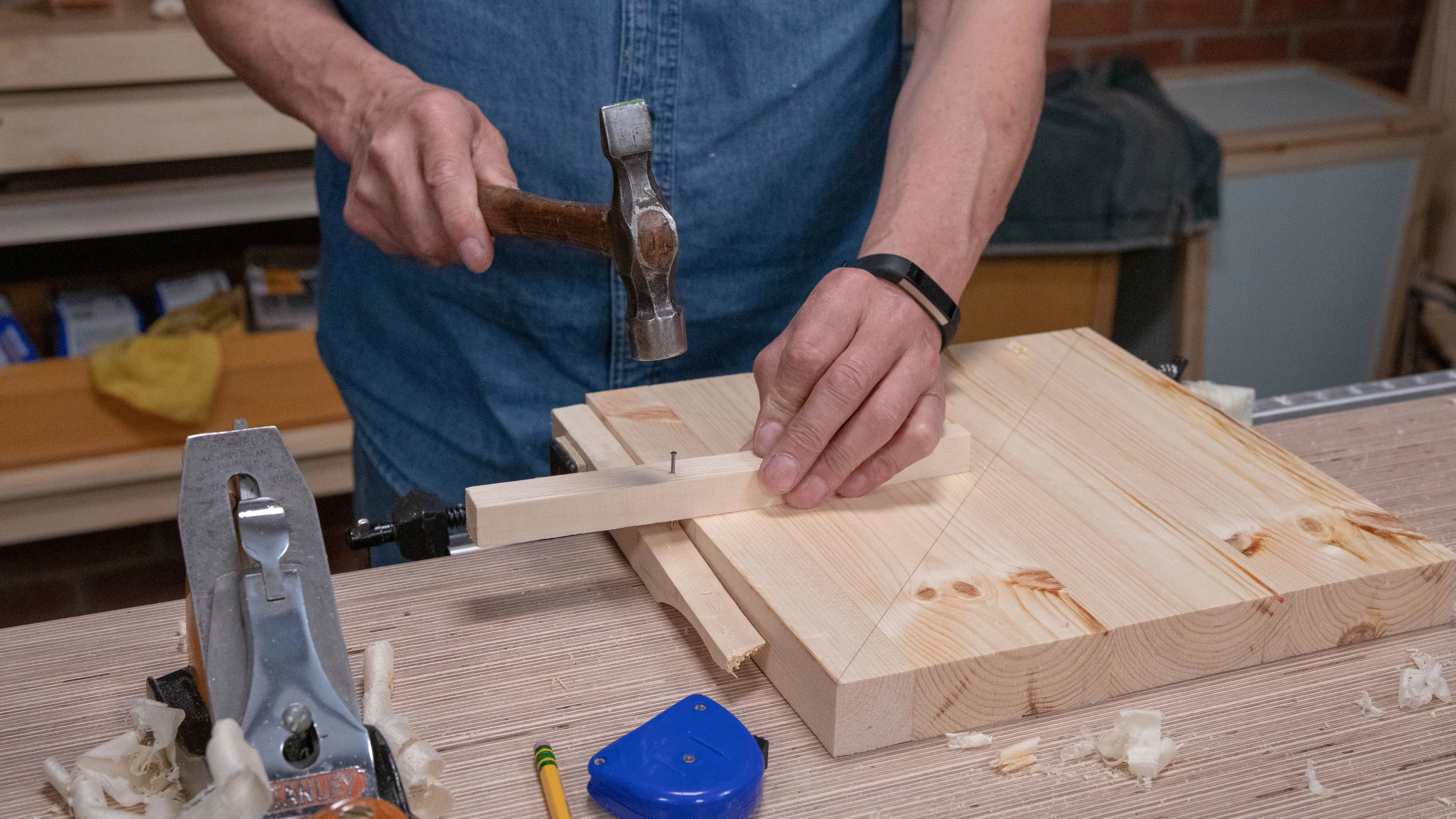 Drive a medium size nail to act as a pivot