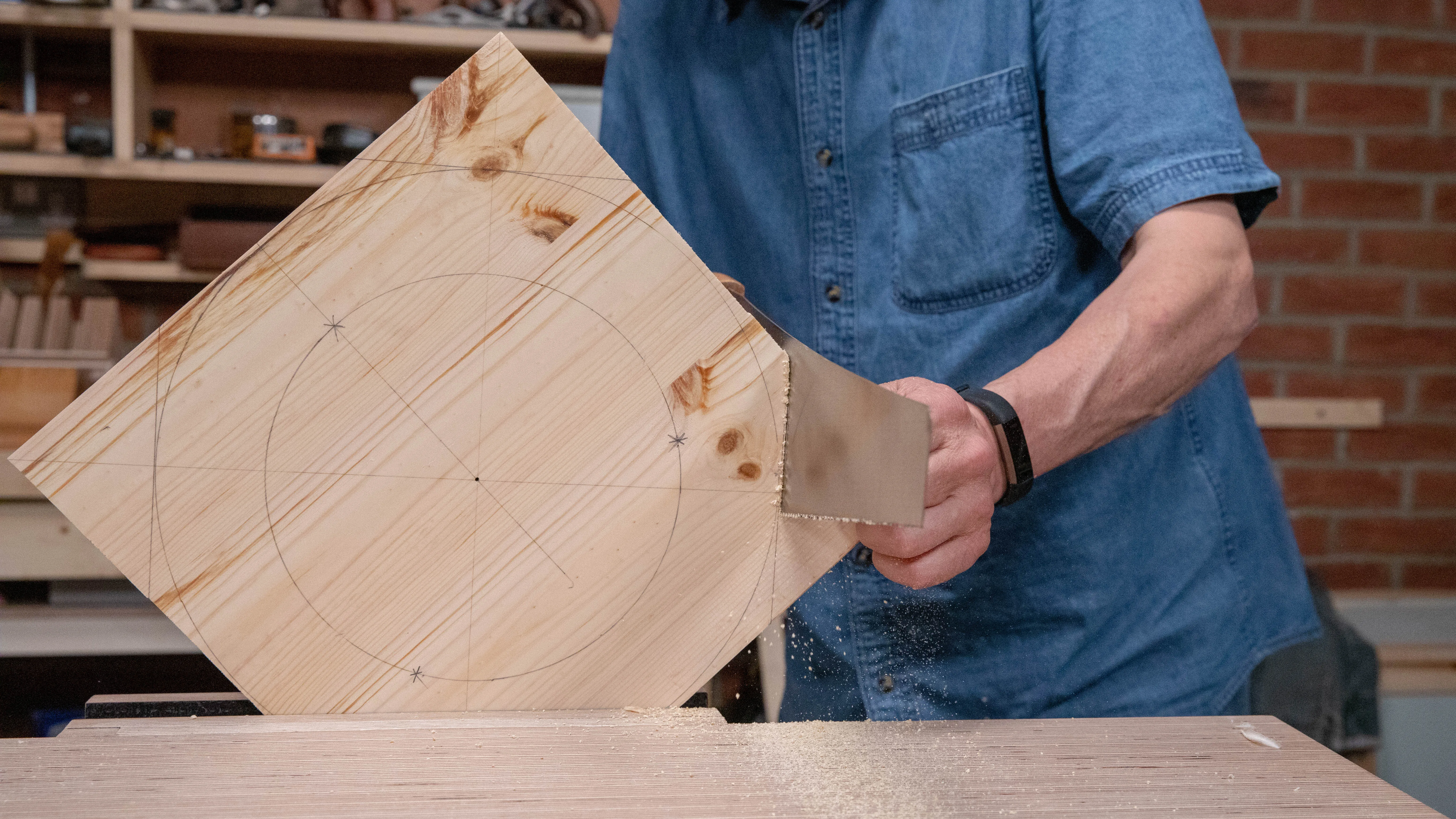 Clamp securely in the vise and saw down each cut line, being careful not to split on the outcut