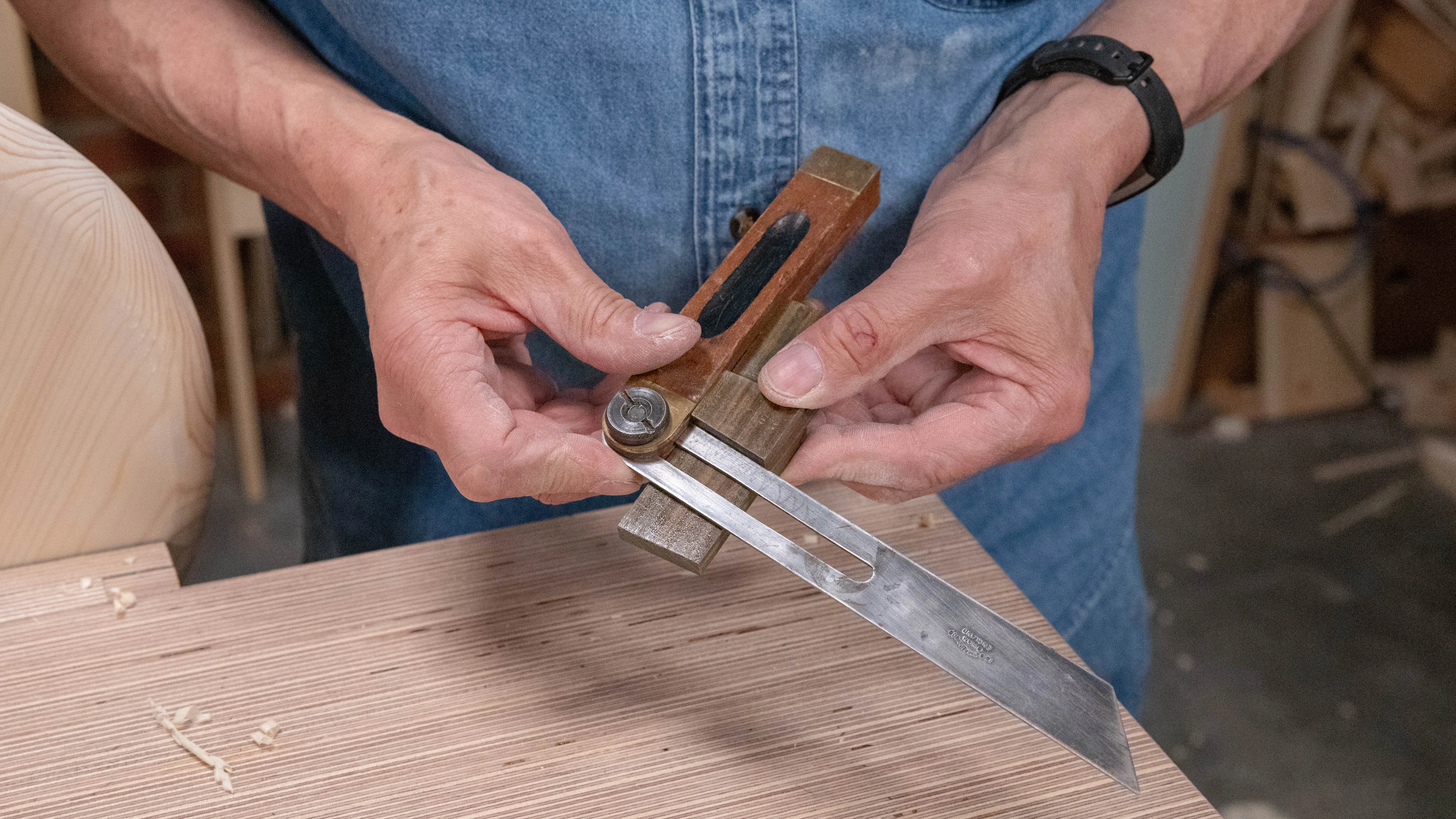 Set a sliding bevel to the angle on your dovetail template