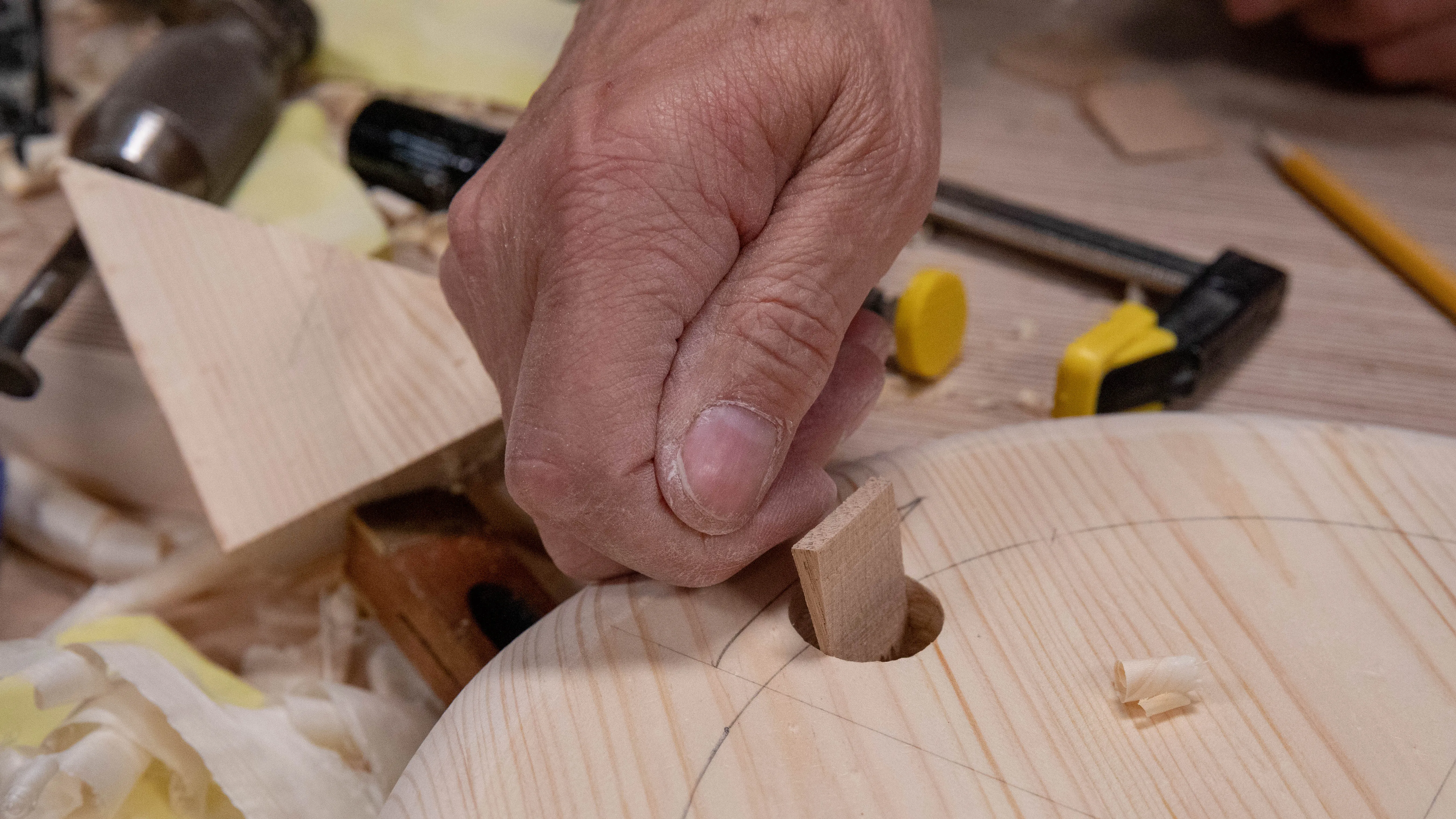 Make sure each wedge fits in the holes