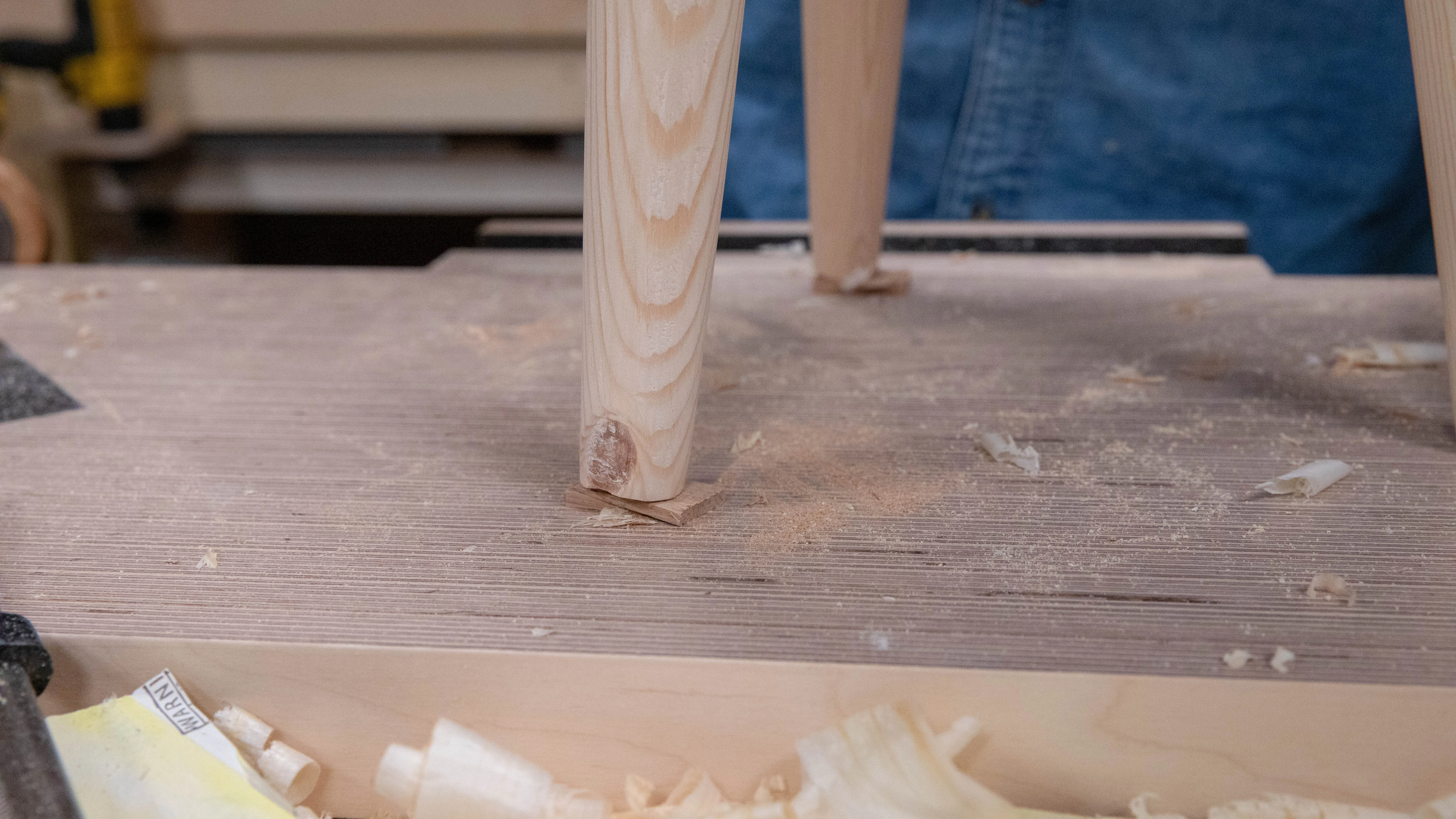 Put a packer under the shorter leg, or even on two