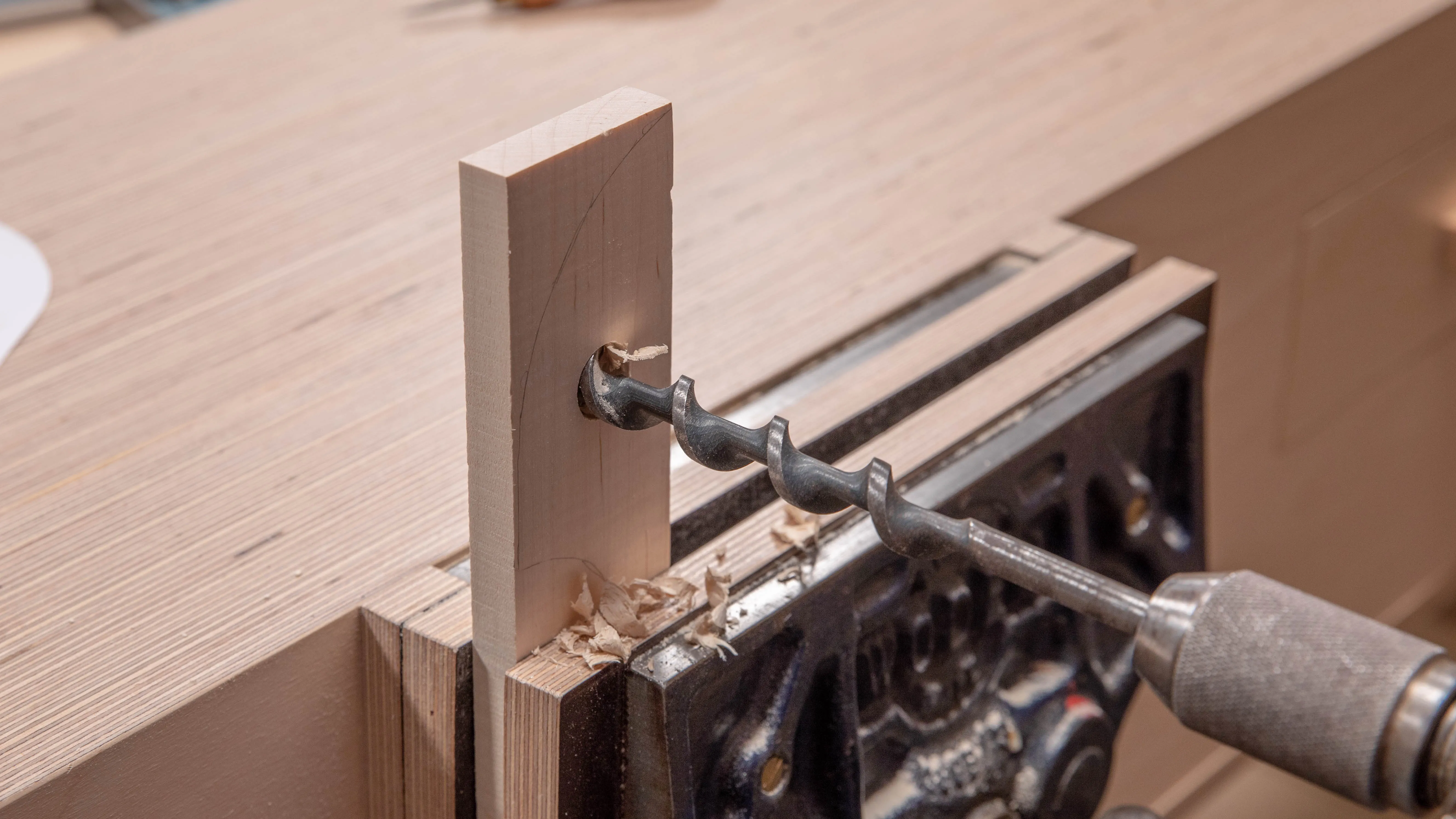 Position the snail on the center mark and stay horizontal as you start boring the hole