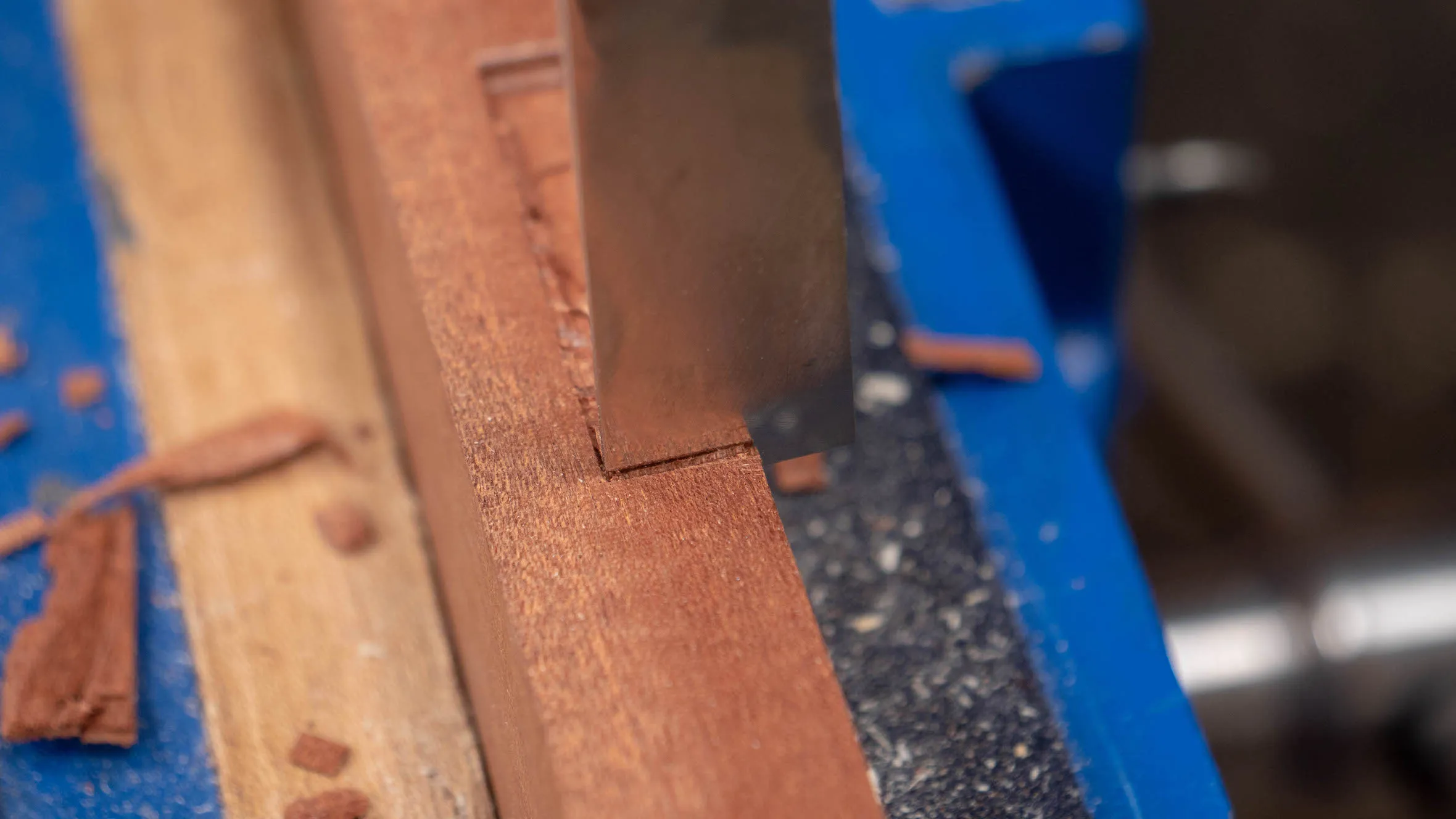 Slightly away from your knifewall, make a perpendicular chop