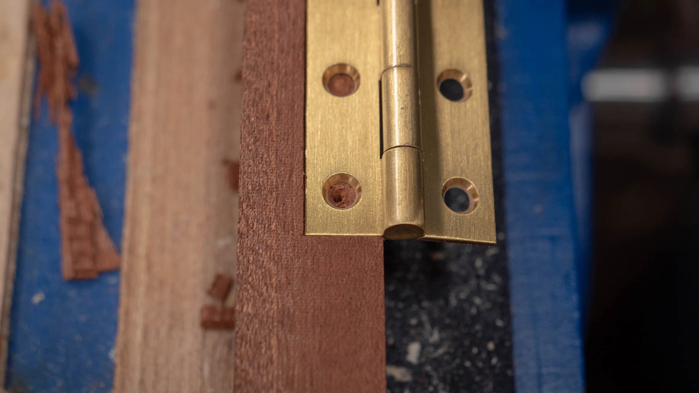 This will ensure the hinge is pushed up against the back of the recess when the screws are fitted