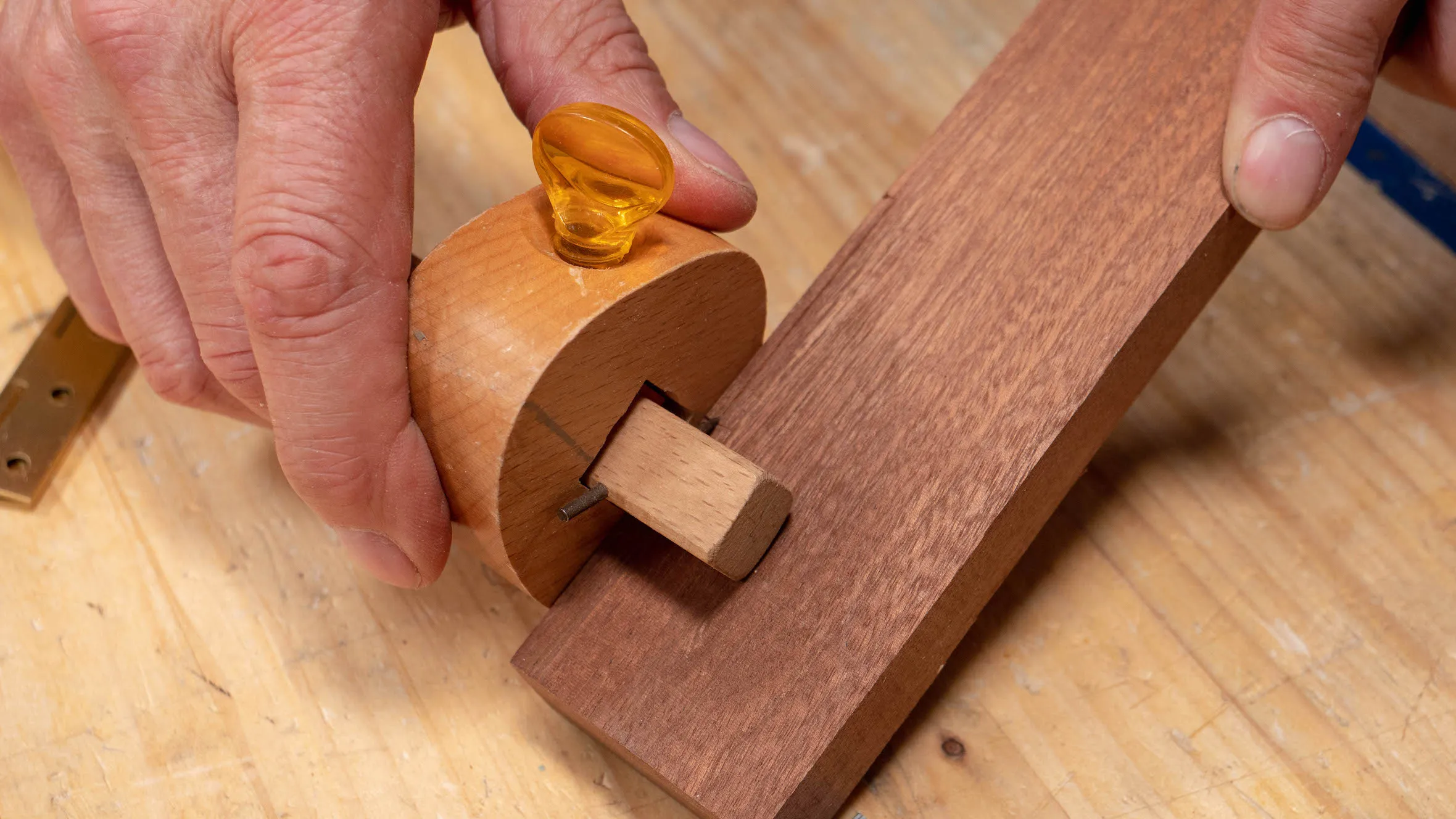 Run the gauge between the two knife nicks to mark out the depth of the recess