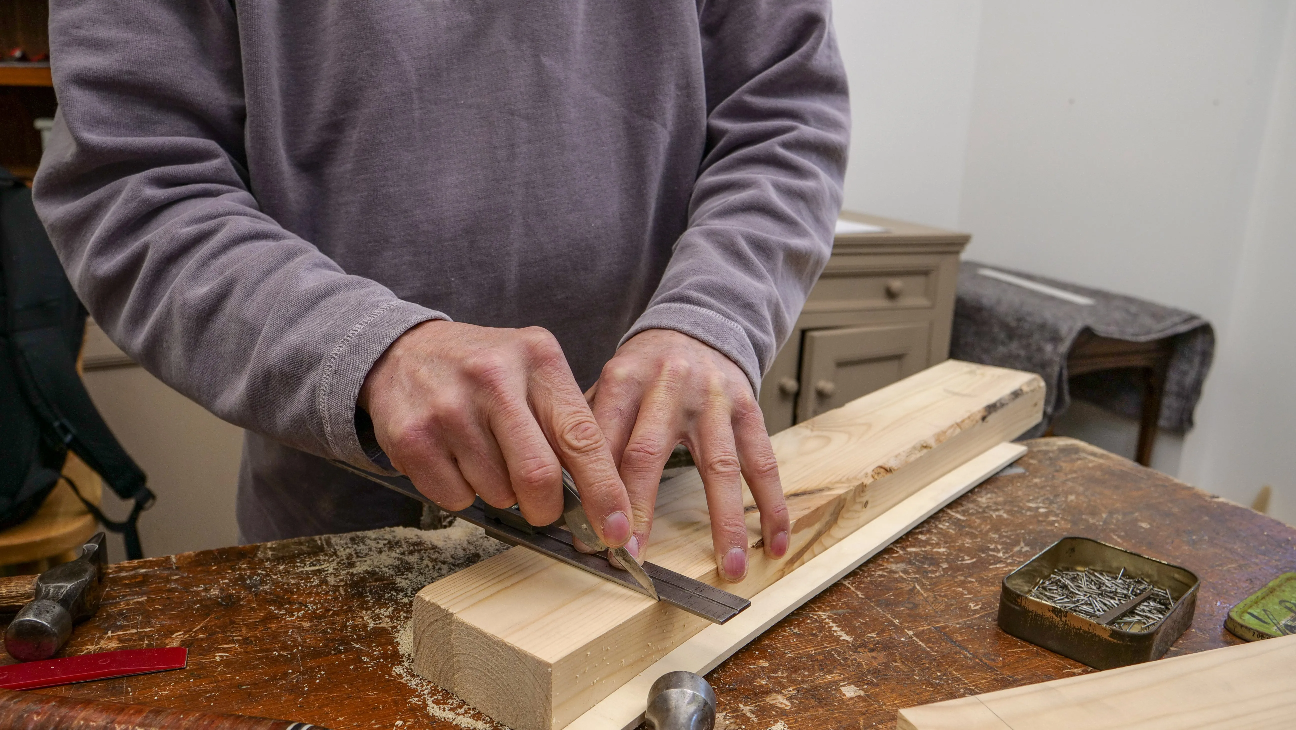Lightly press down on the top of the blade on the first pass with the knife and then press firmly on the second pass to ensure you have severed through the wood fibres