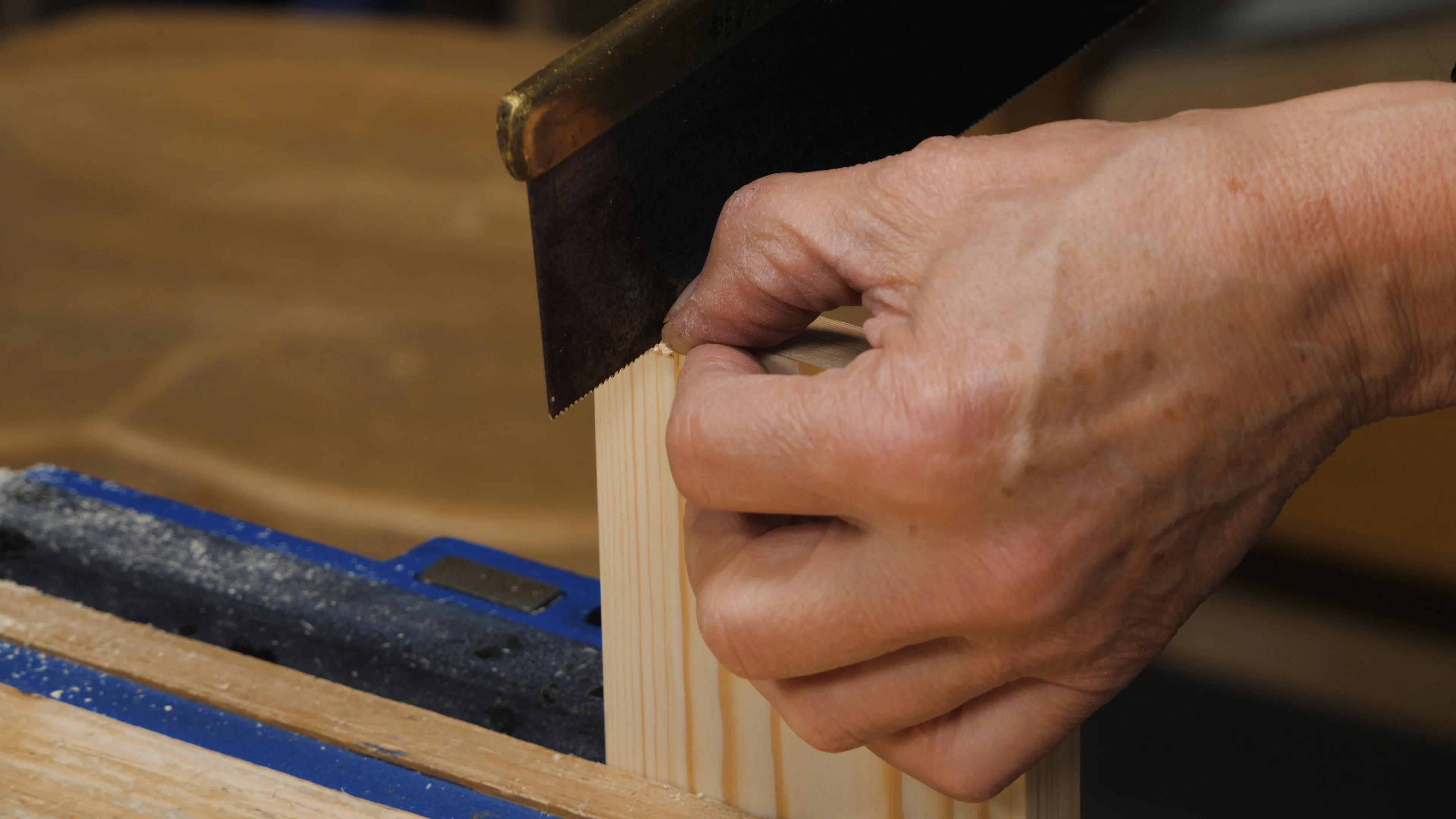 Either saw down the (short) length of the notch …