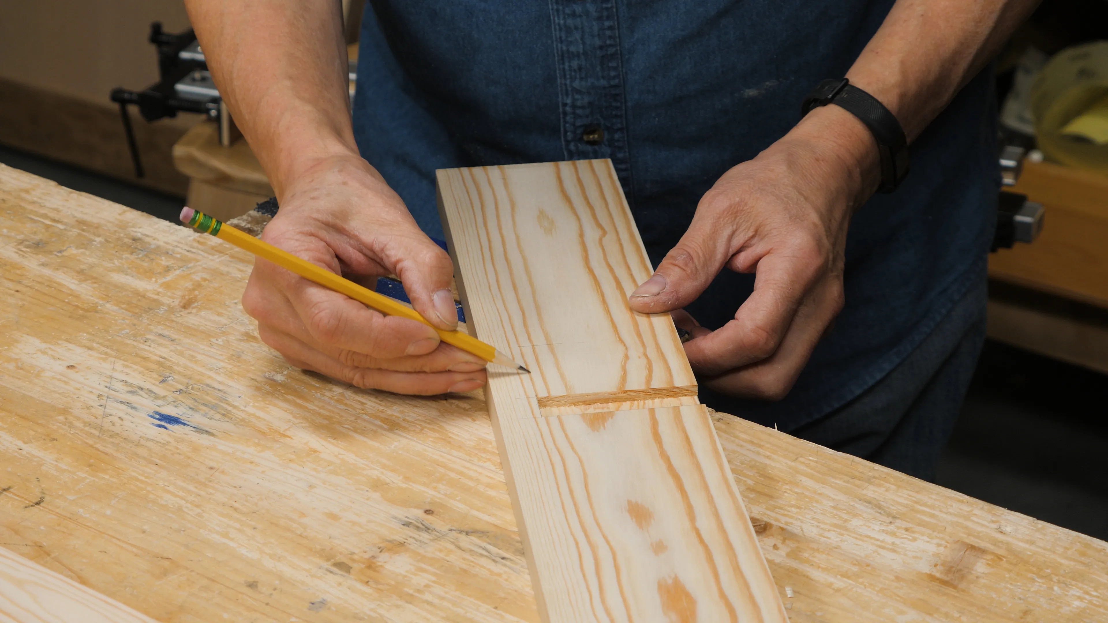 The front of the mortises should be aligned with the front of the housing dado