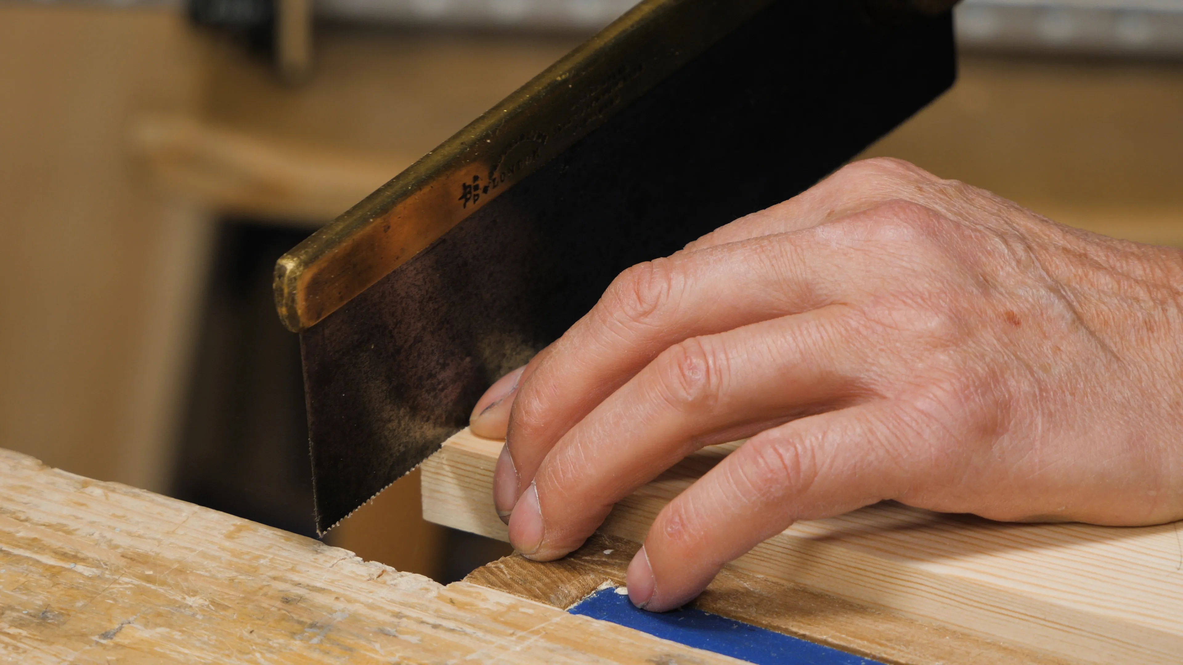 Carefully saw down the shoulder to just above the depth line