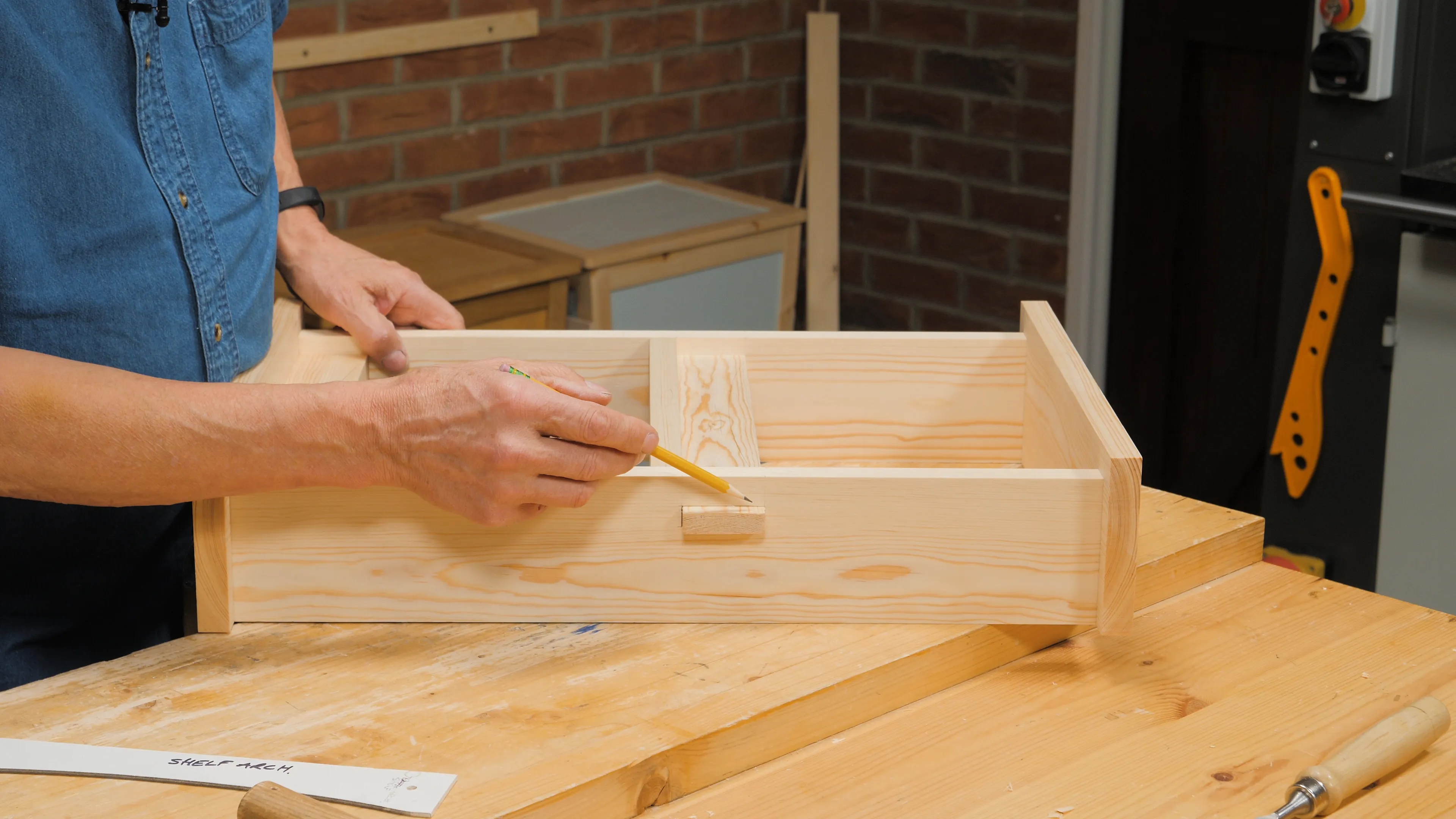 Mark how far the tenons protrude with a pencil