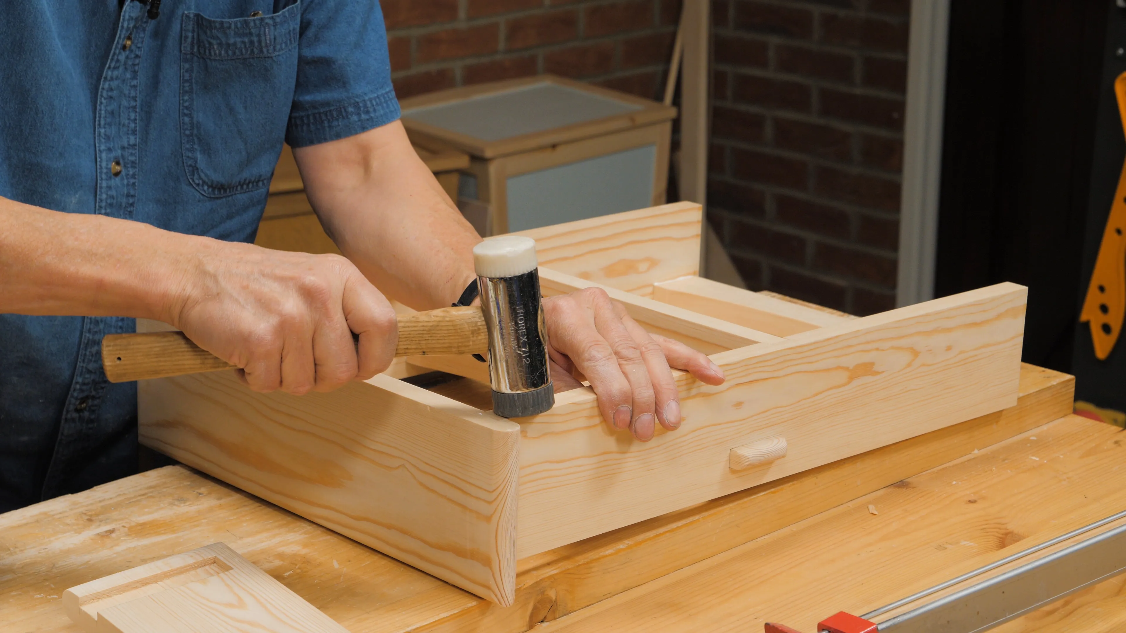 Tap the side pieces to close any gaps along the front