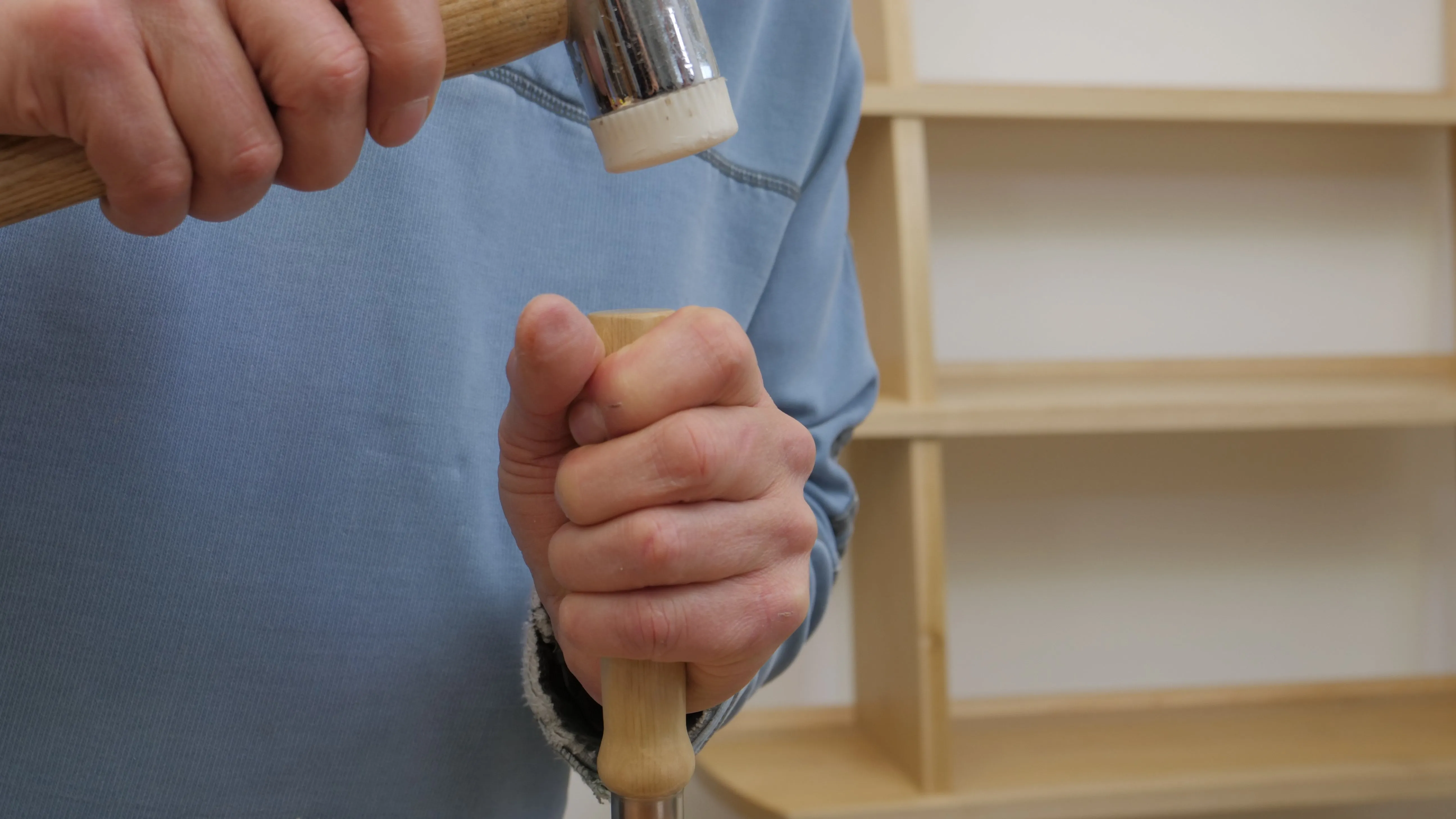 This gives a secure grip with sufficient ability to shift the angle according to how the wood feels through the chisel.