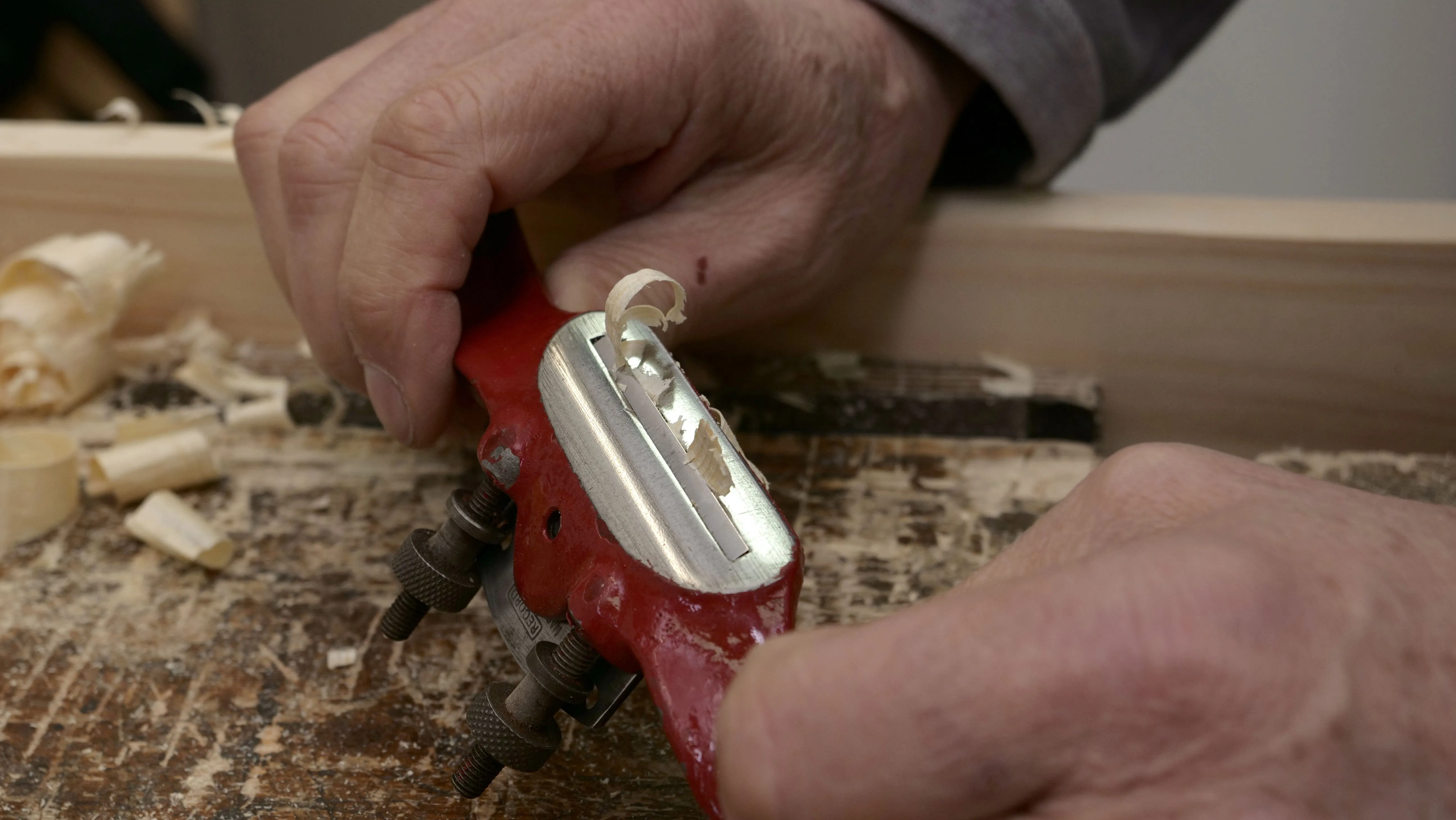 Remove the waste to stop the throat getting clogged up. If you cannot remove the material then take the blade out.