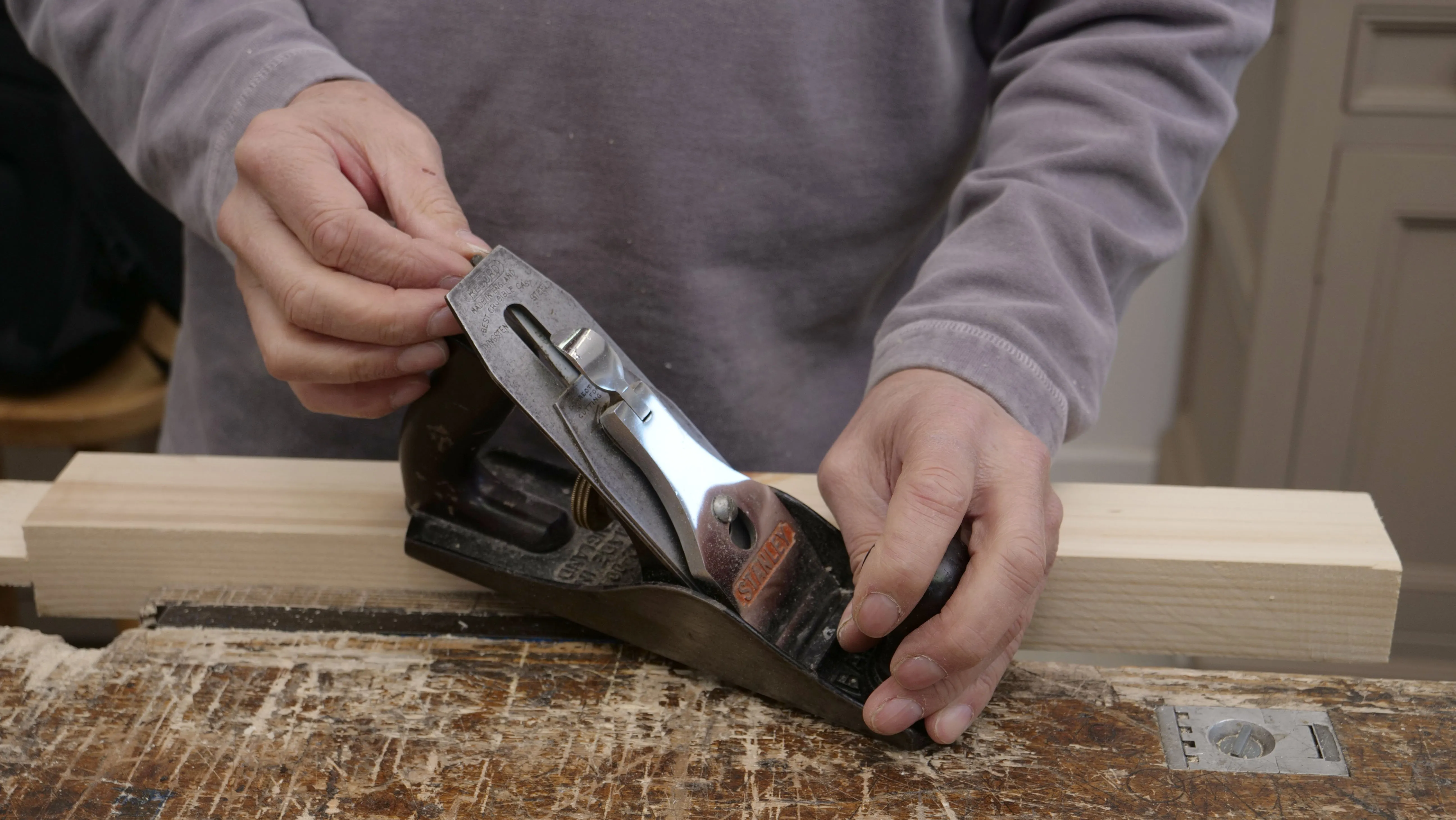 The lateral adjustment lever can be moved side to side to adjust each side of the blade so you can get an even cut