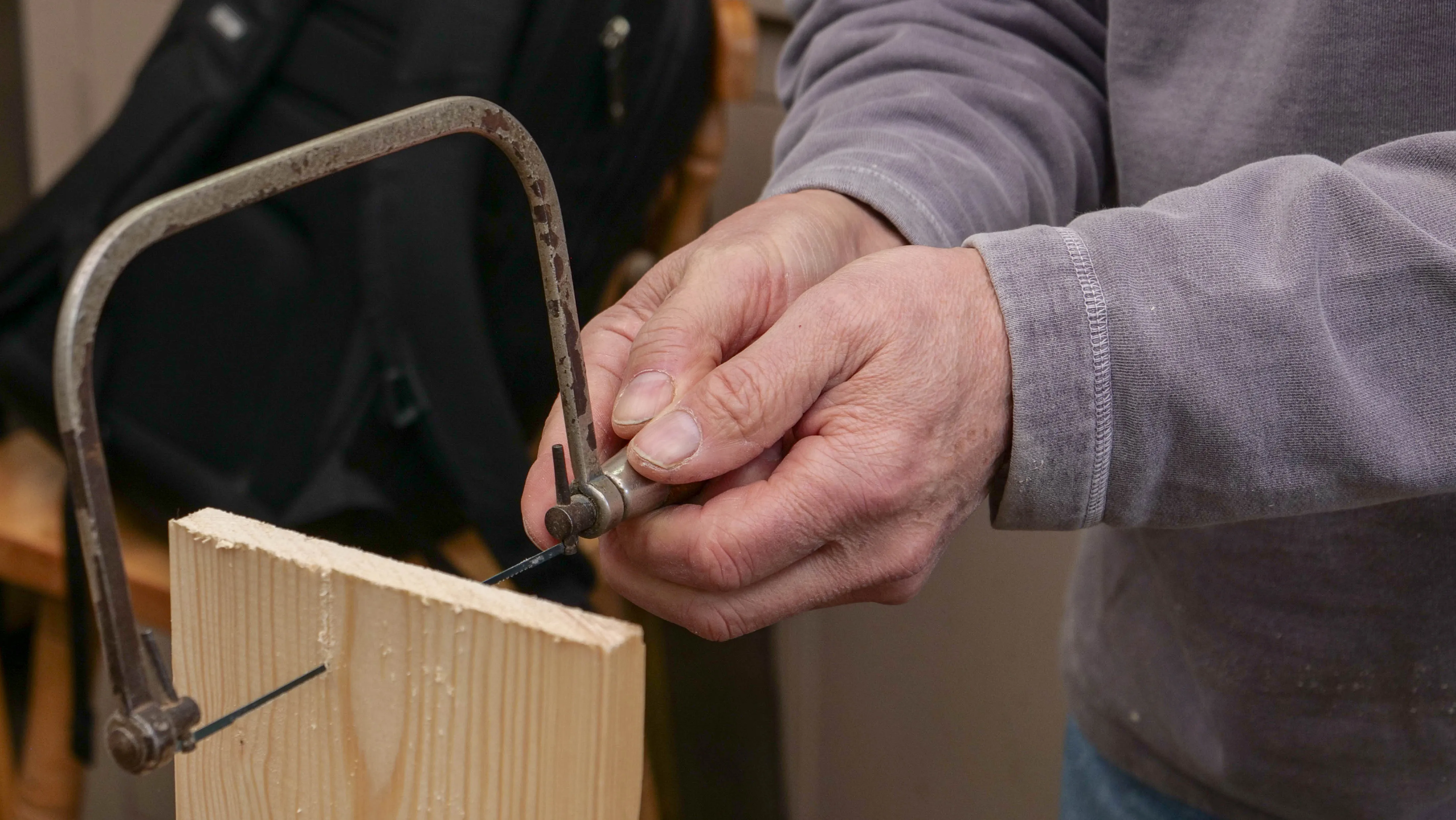 Use two hands to hold the handle