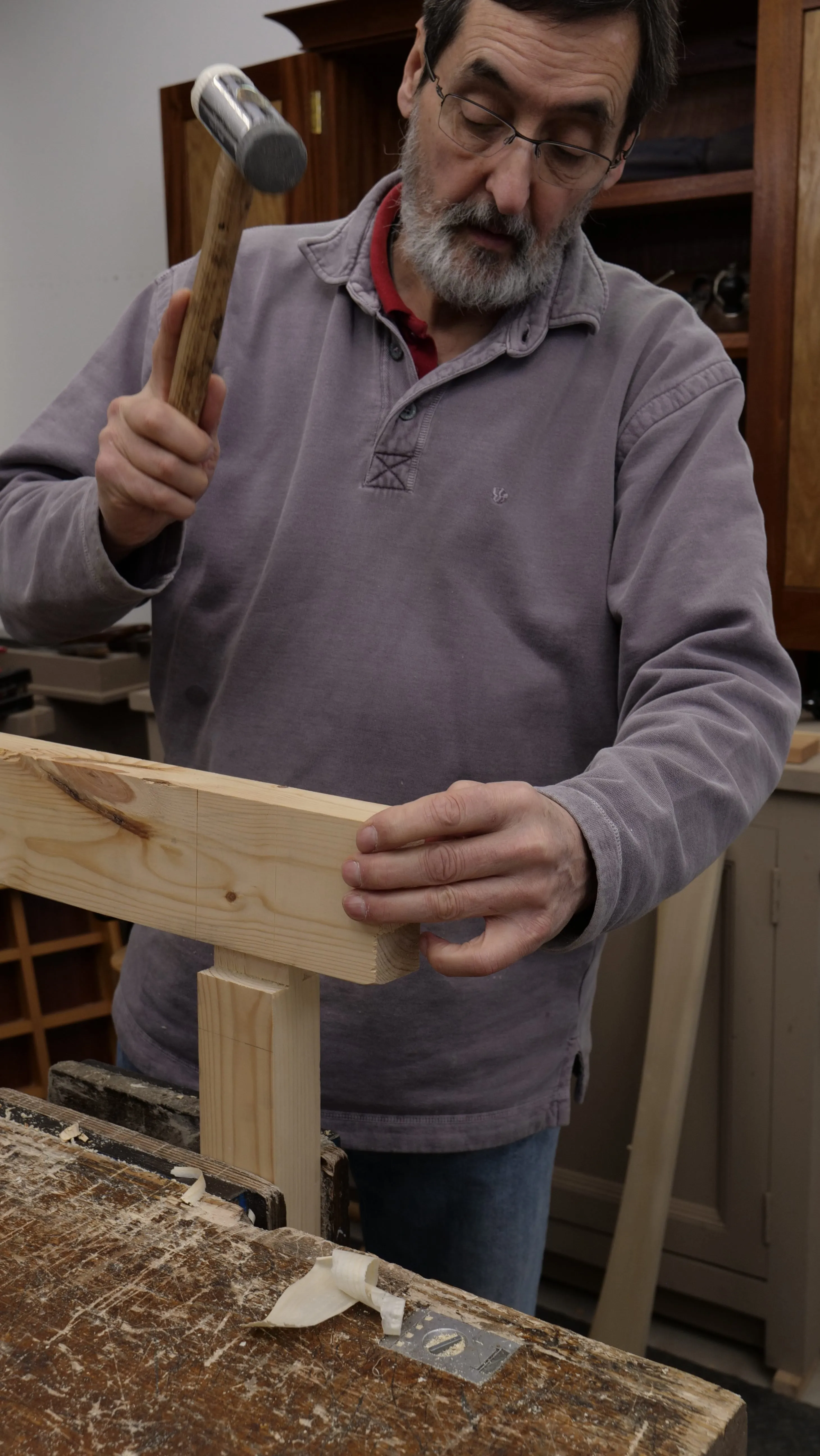 Use the rubber face of the chisel hammer to help drive joints together. This will not damage the surface of your project.