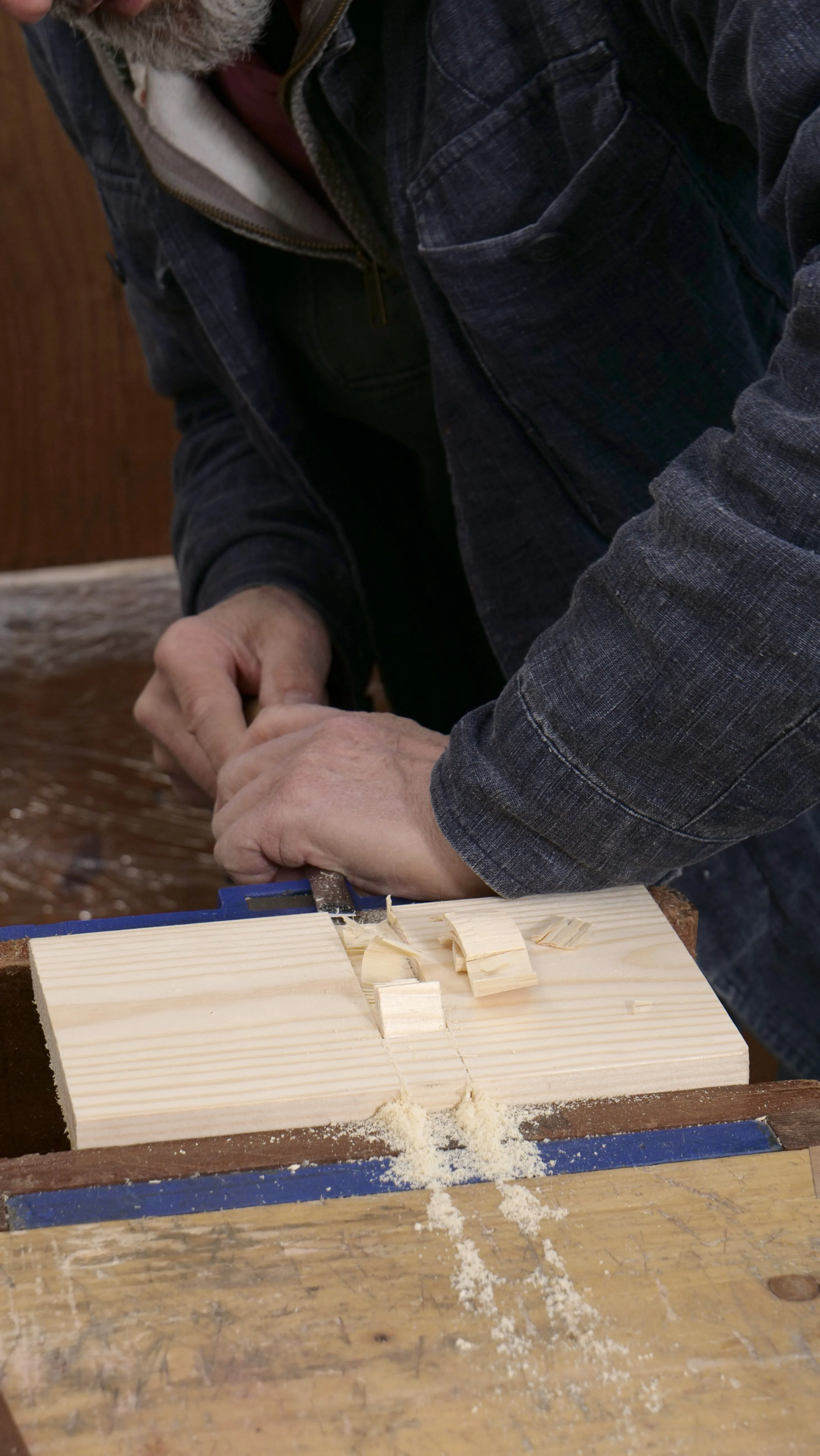 Remove the bulk of the material using a chisel. You can use a hammer to strike the end, or the heel of your hand.