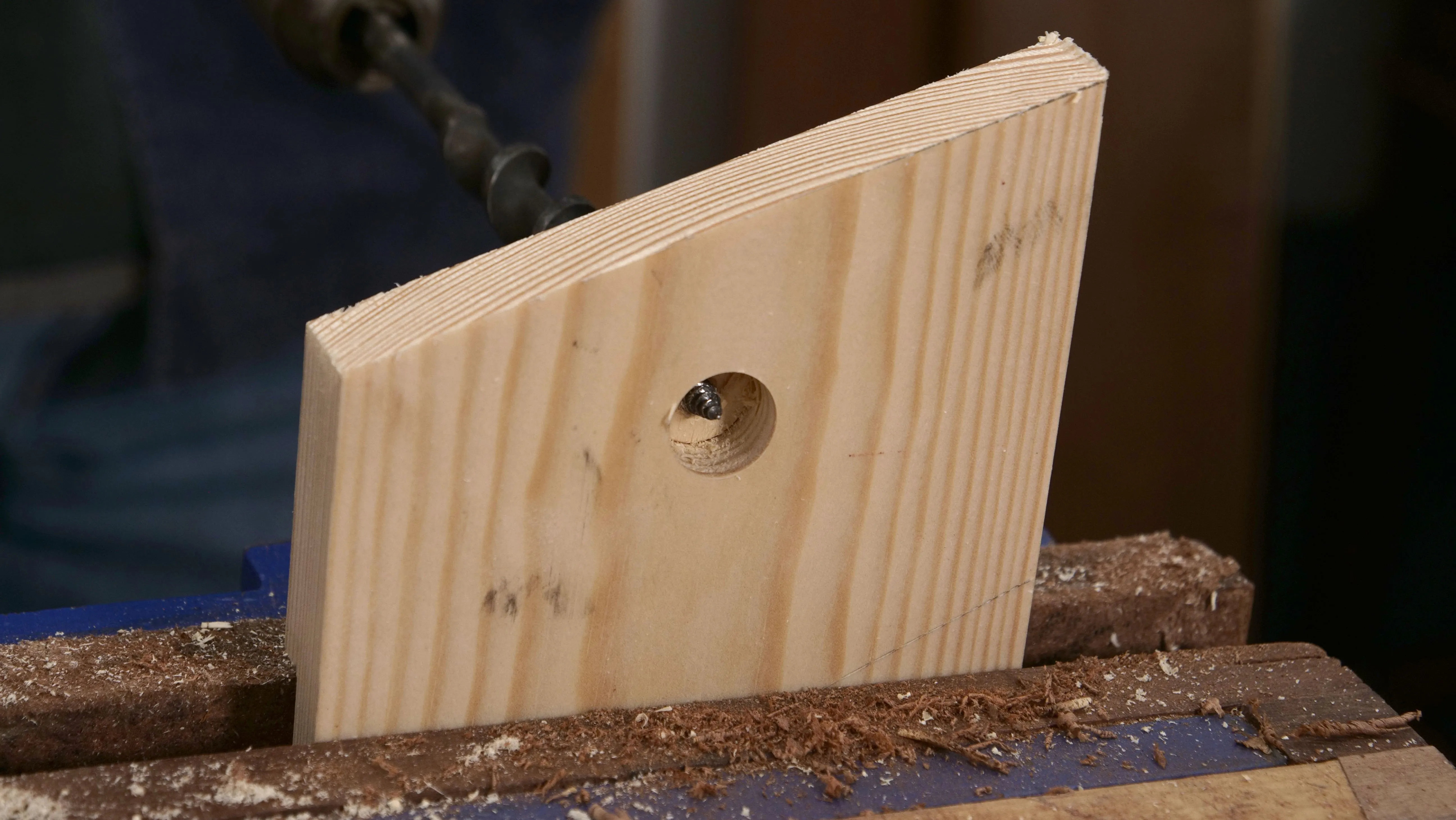 By not continuing to bore from one side, you will avoid splitting the wood when the bit is fully through