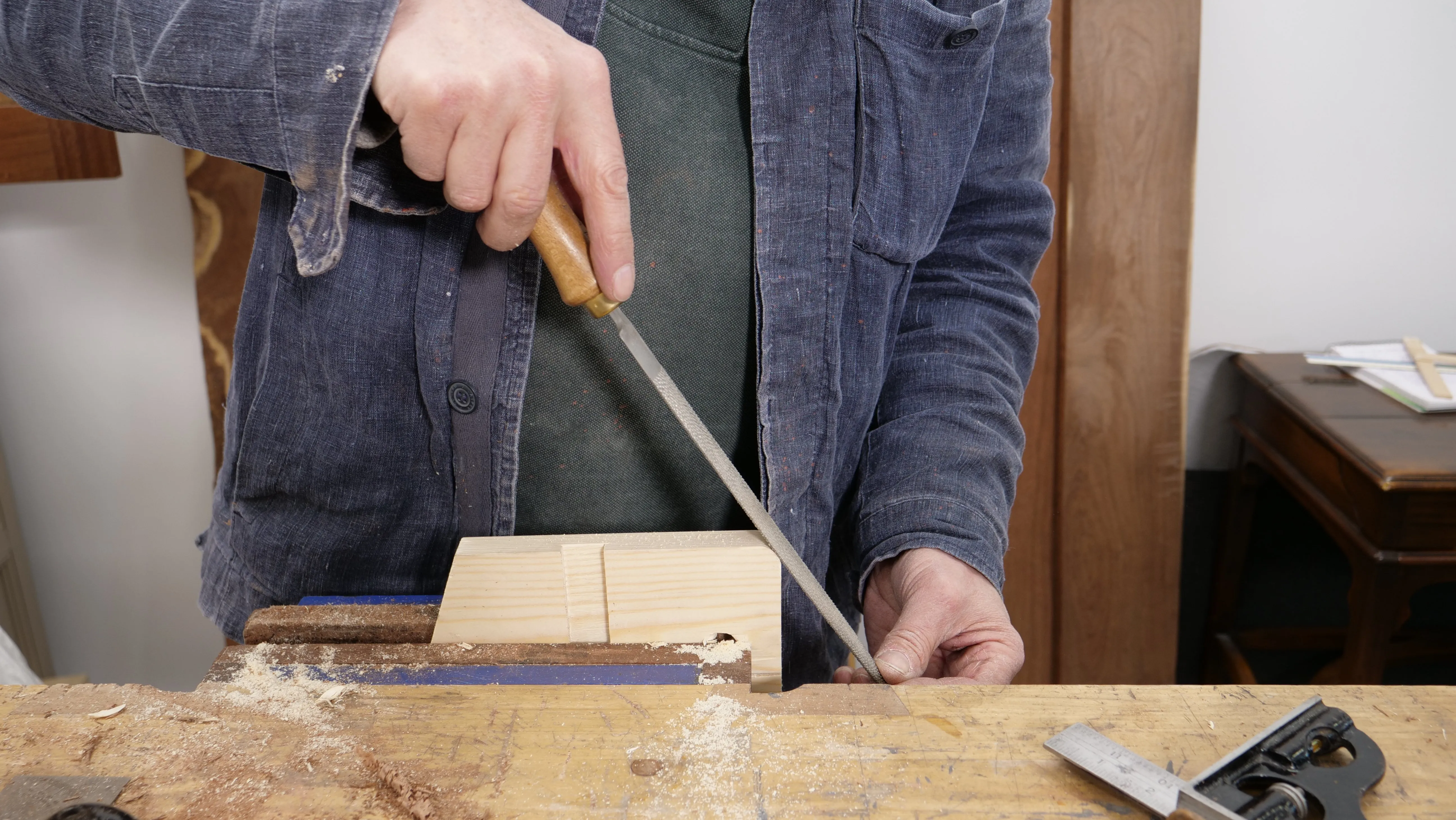 To get an even rounded corner, make sure to use the same pressure as you push the rasp forward and it should result in an evenly rounded edge.