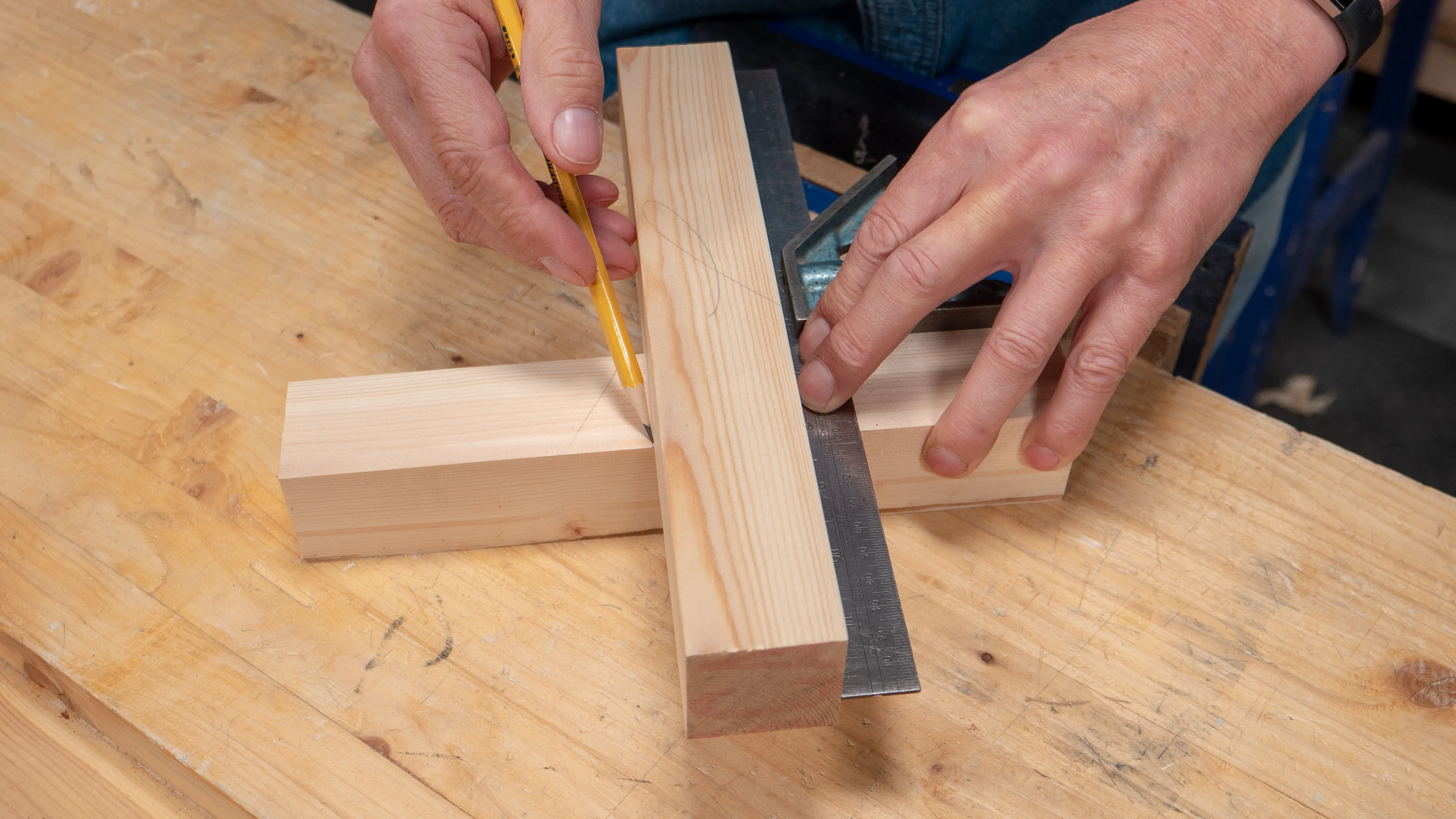Use the tenon piece up against your square to mark the overall length of your mortise hole