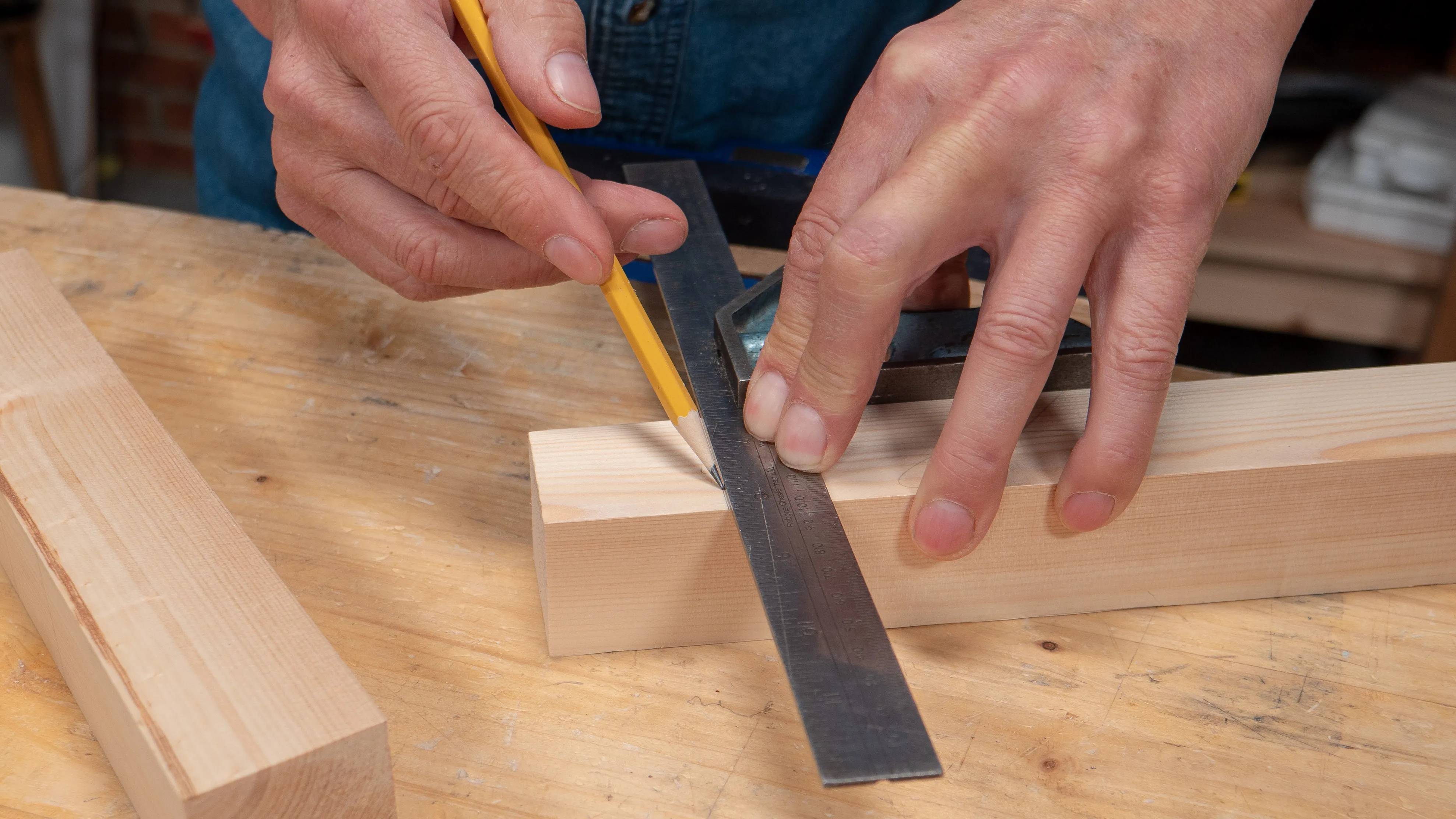 Keep the square in place and mark the depth of the tenon