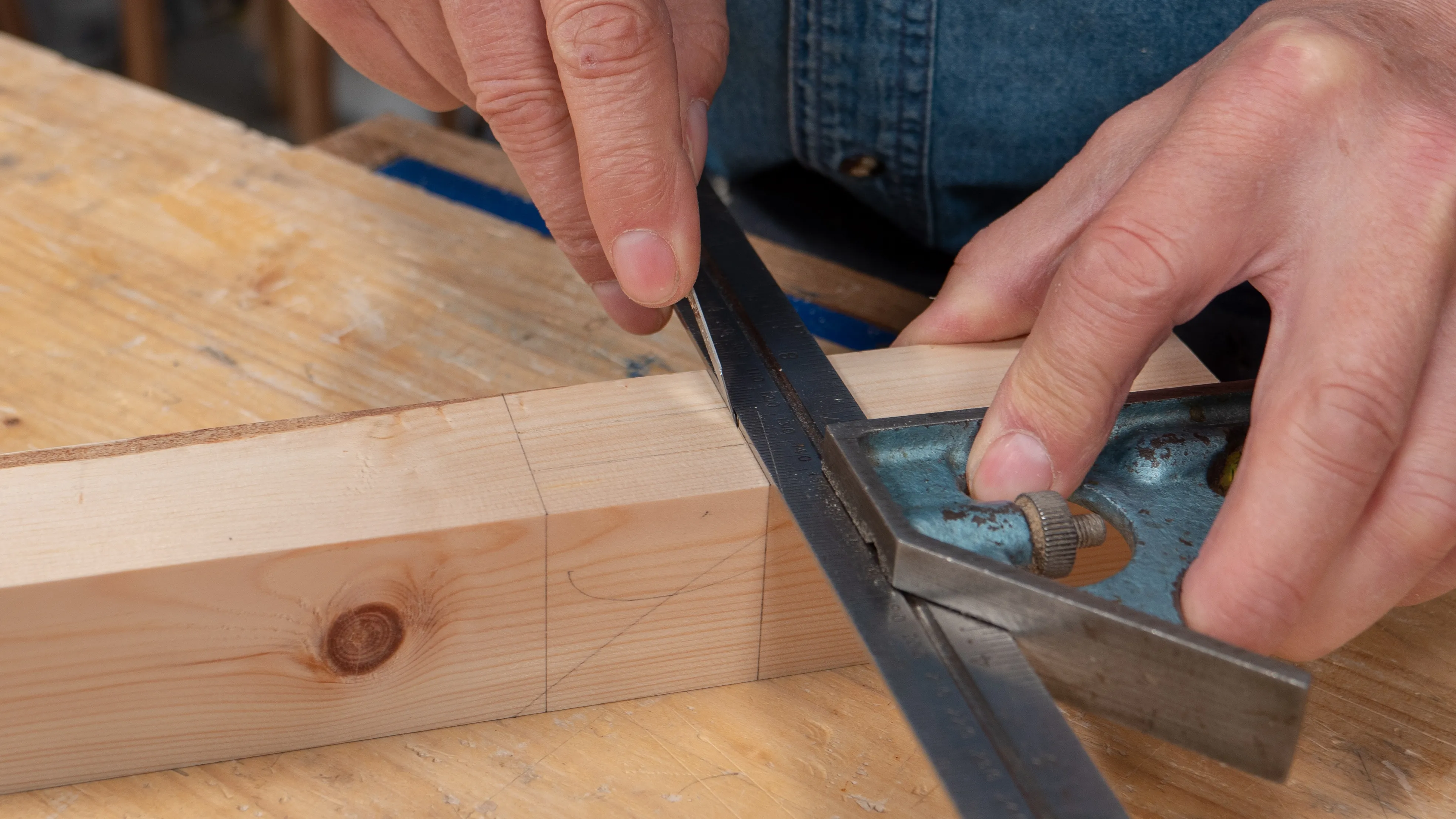 Use the square and knife to mark the end of the mortise hole