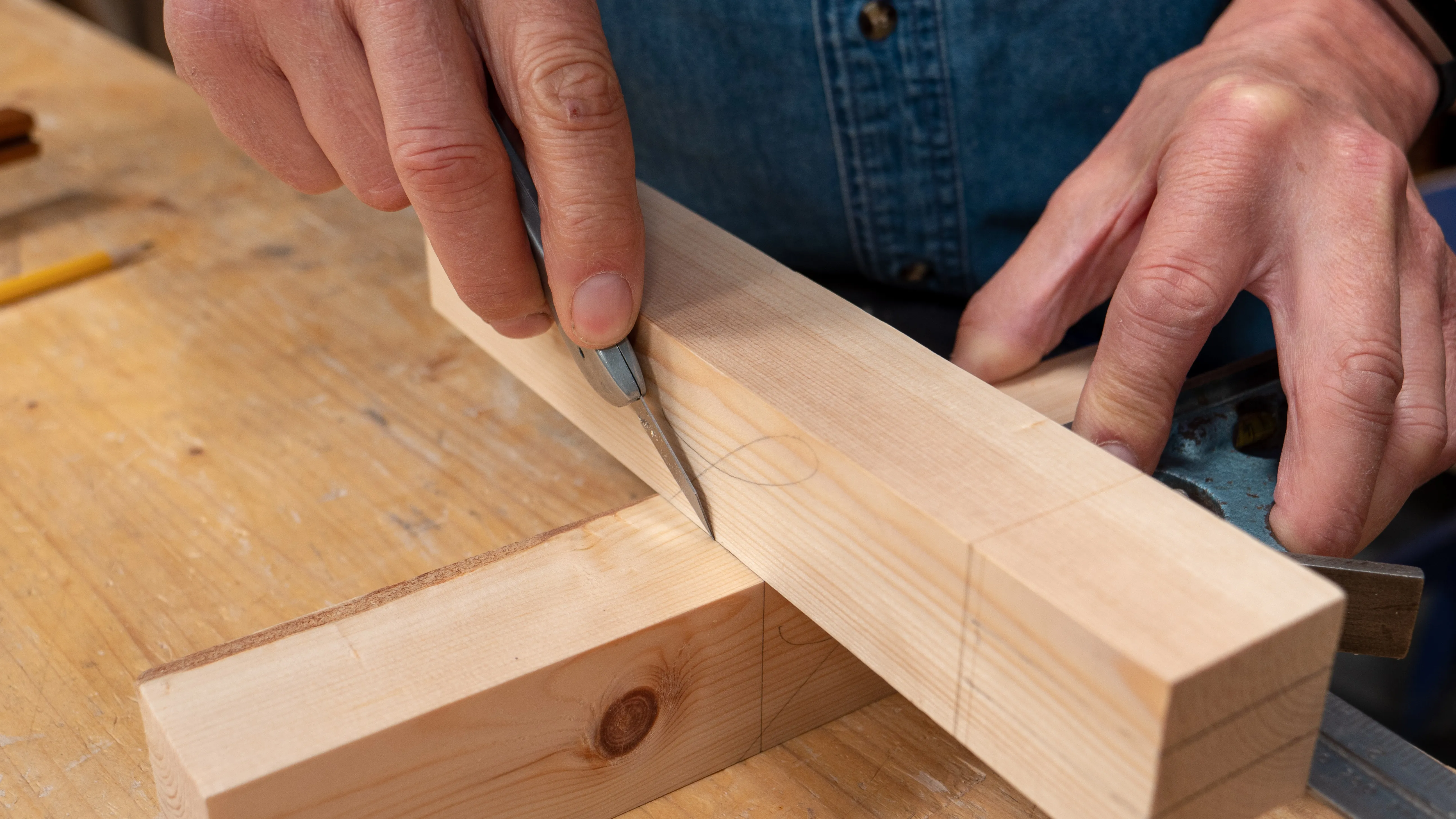 Use your tenon piece for the exact width and make a knife nick
