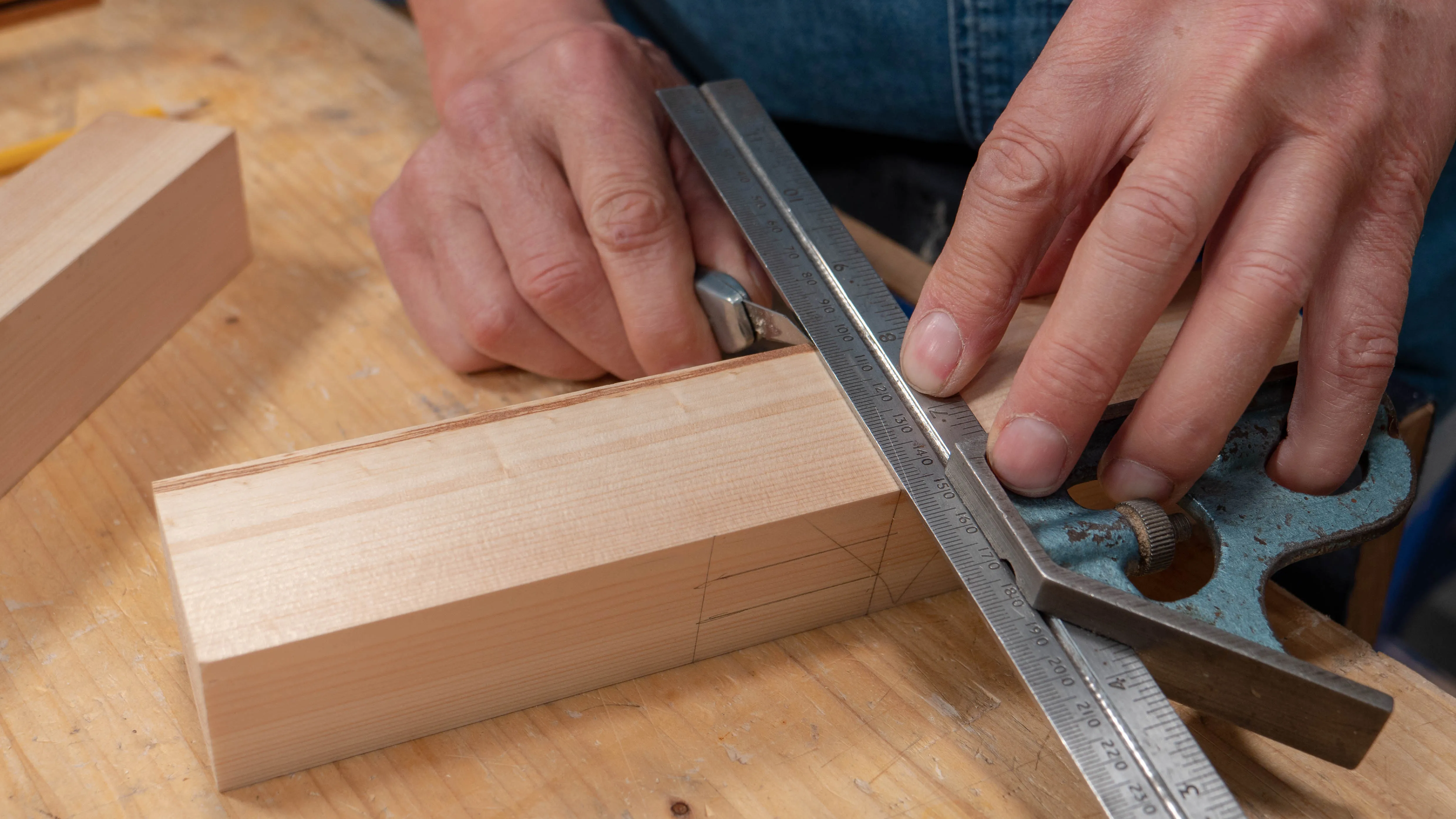 Turn your wood and flip the square so it is registered on a registration face, make a nick