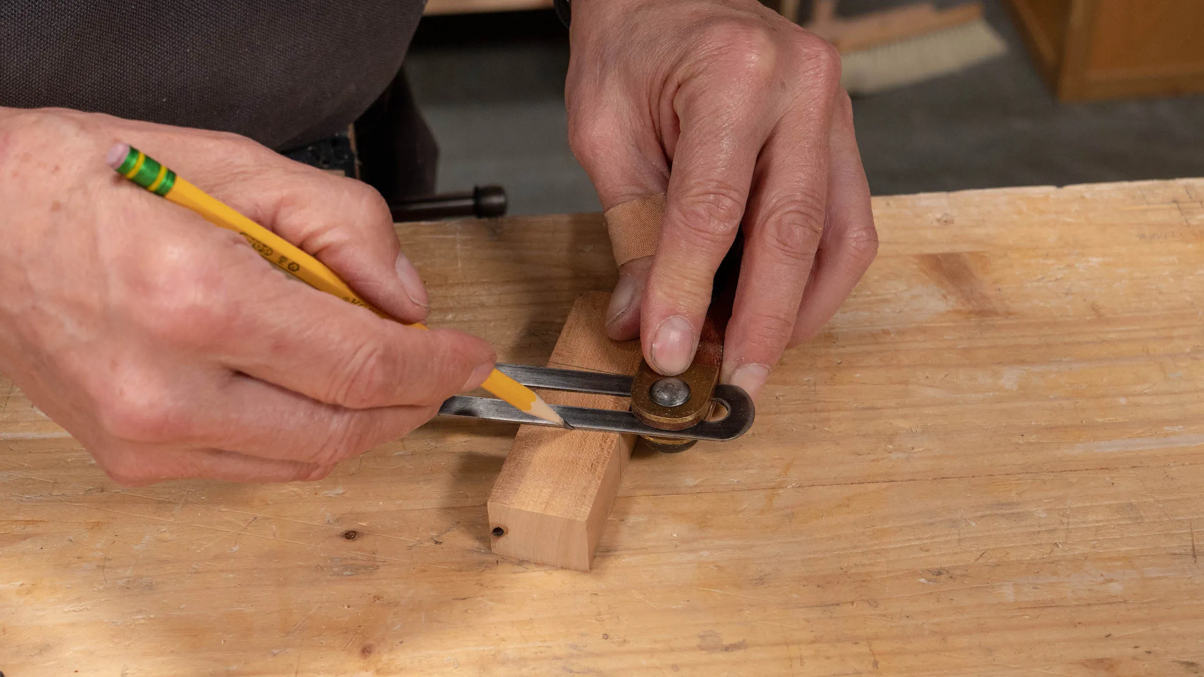 Mark the angle using the sliding bevel, flip the wood over to the opposite face and mark out the angle on this side