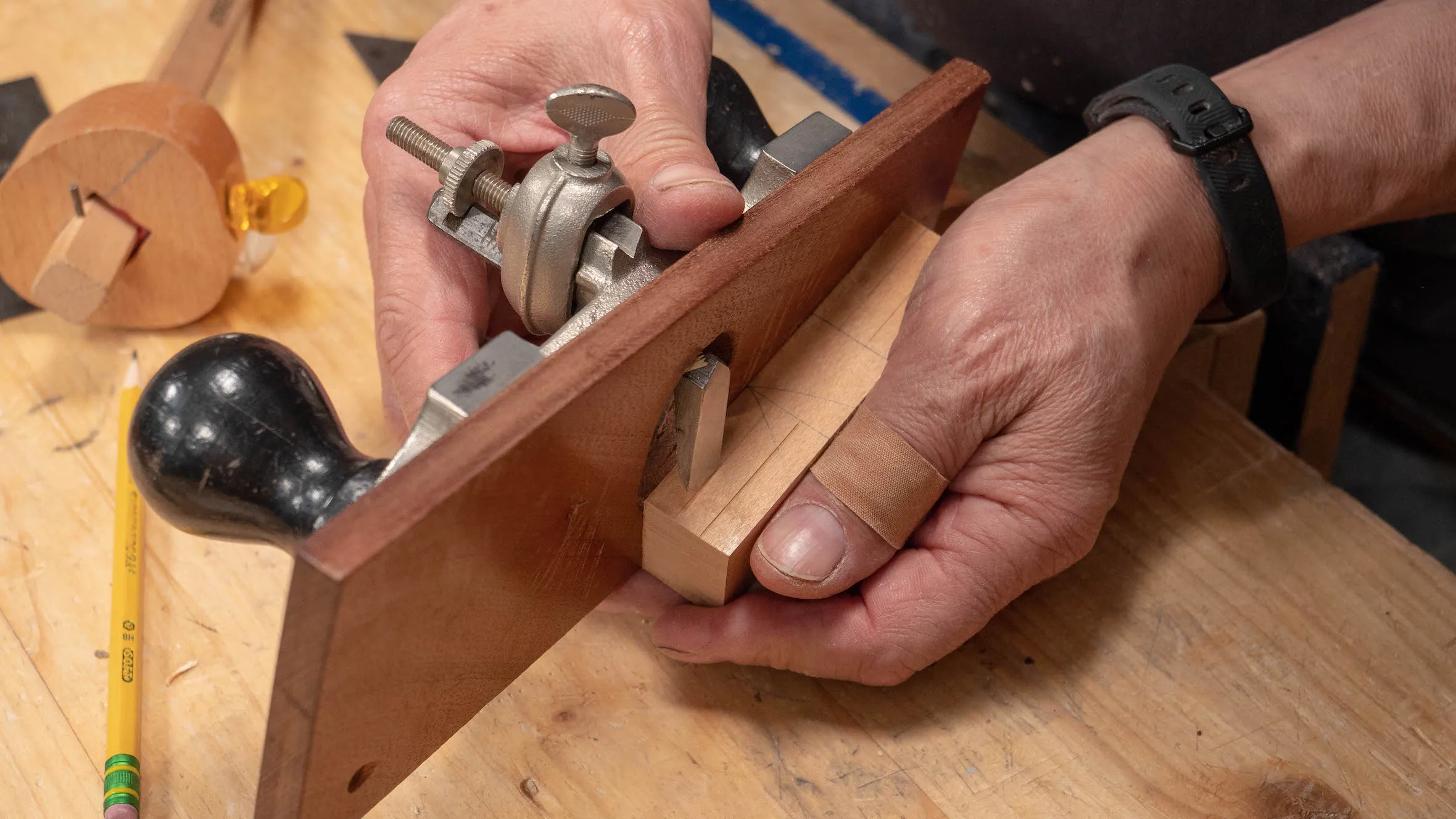 Run the router plane down the sides of your dovetail template
