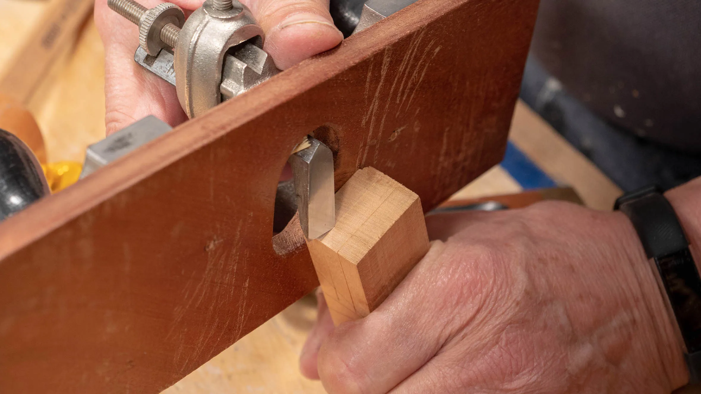 The sharp edge of the router blade makes a definitive mark