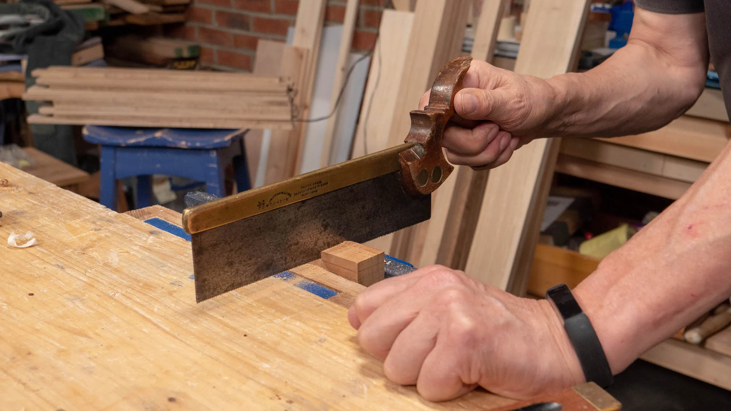 Place your hand on the bench for stability