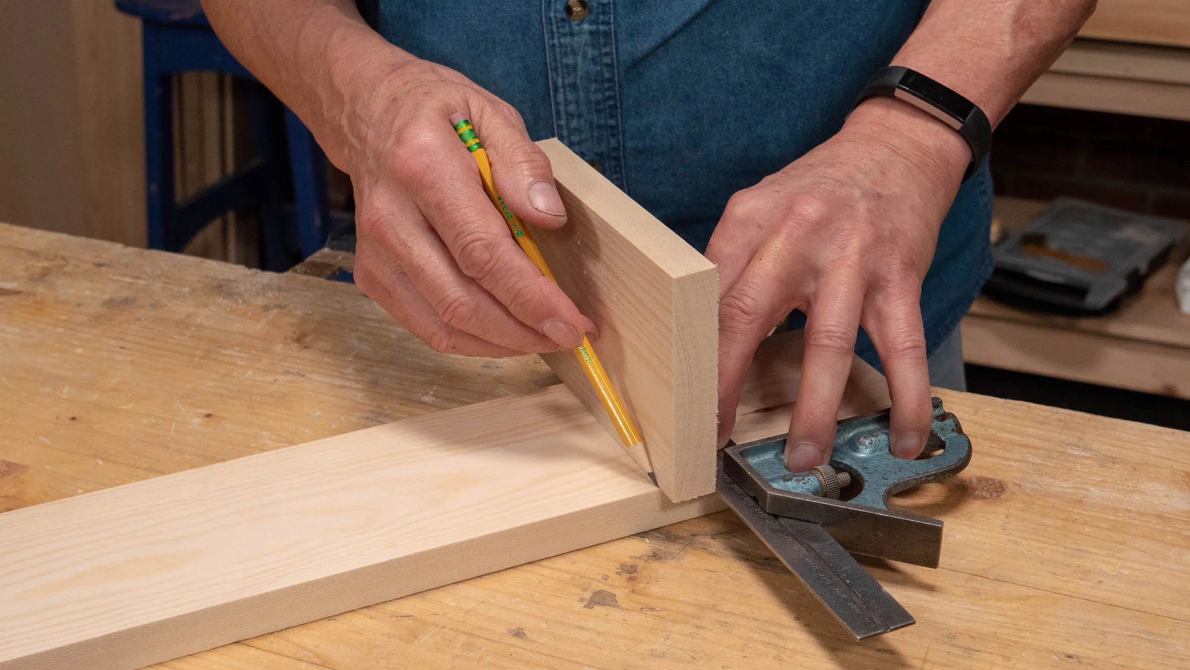 Place the second piece against the square and trace a pencil line on the other side to mark the width