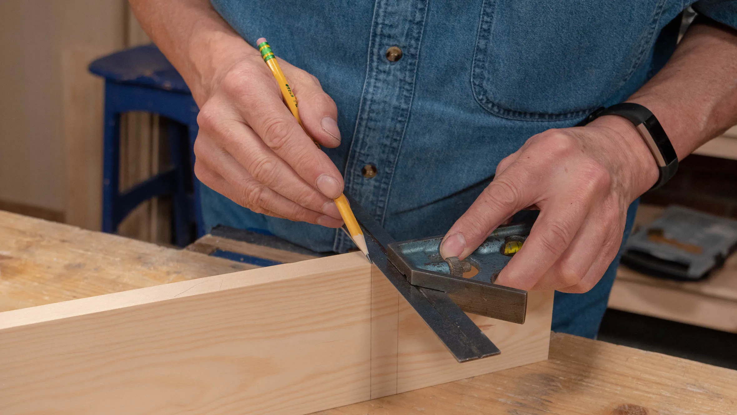 Carry the lines over onto both edges with a square, but only part way