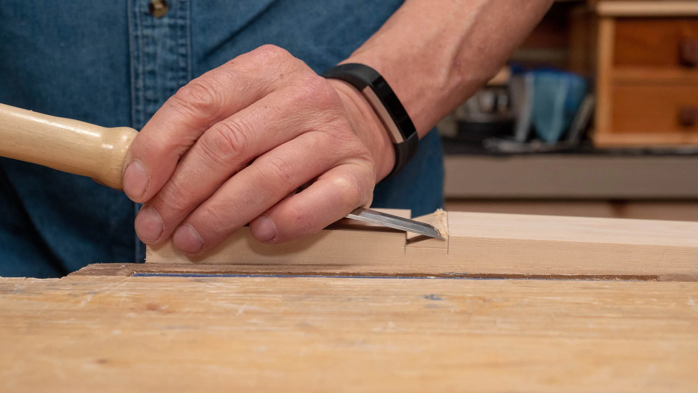 Begin to pare cut from the side. You can register the flat face of the chisel on the first wall for consistency.