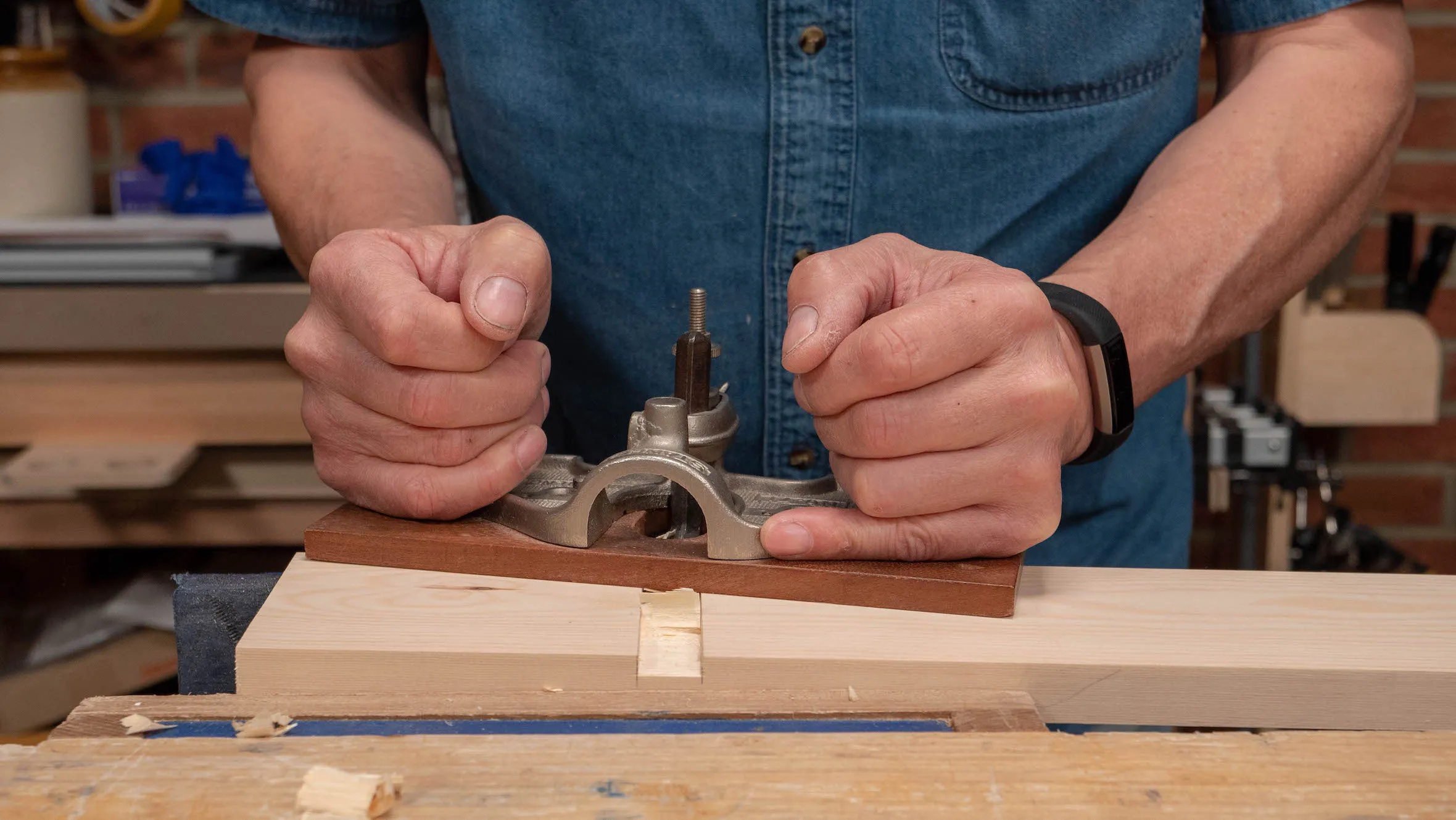Just like a chisel, you can skew the router (and cutter) for a smoother slicing cut