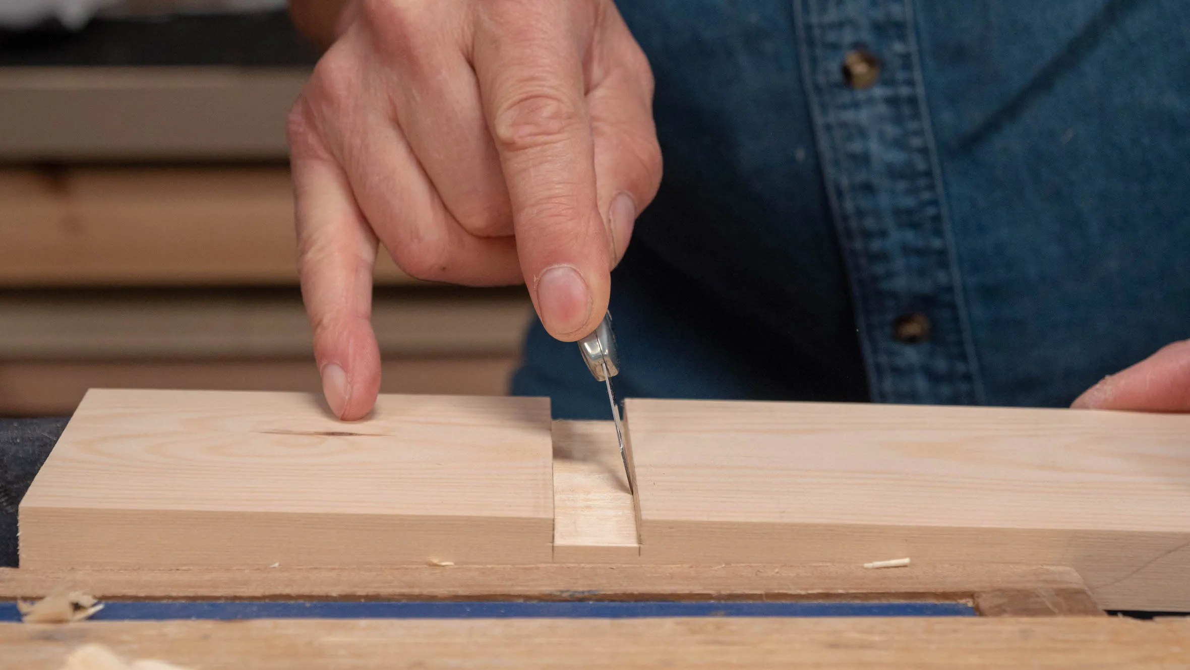 Run the knife along the bottom corners to sever any remaining fibres