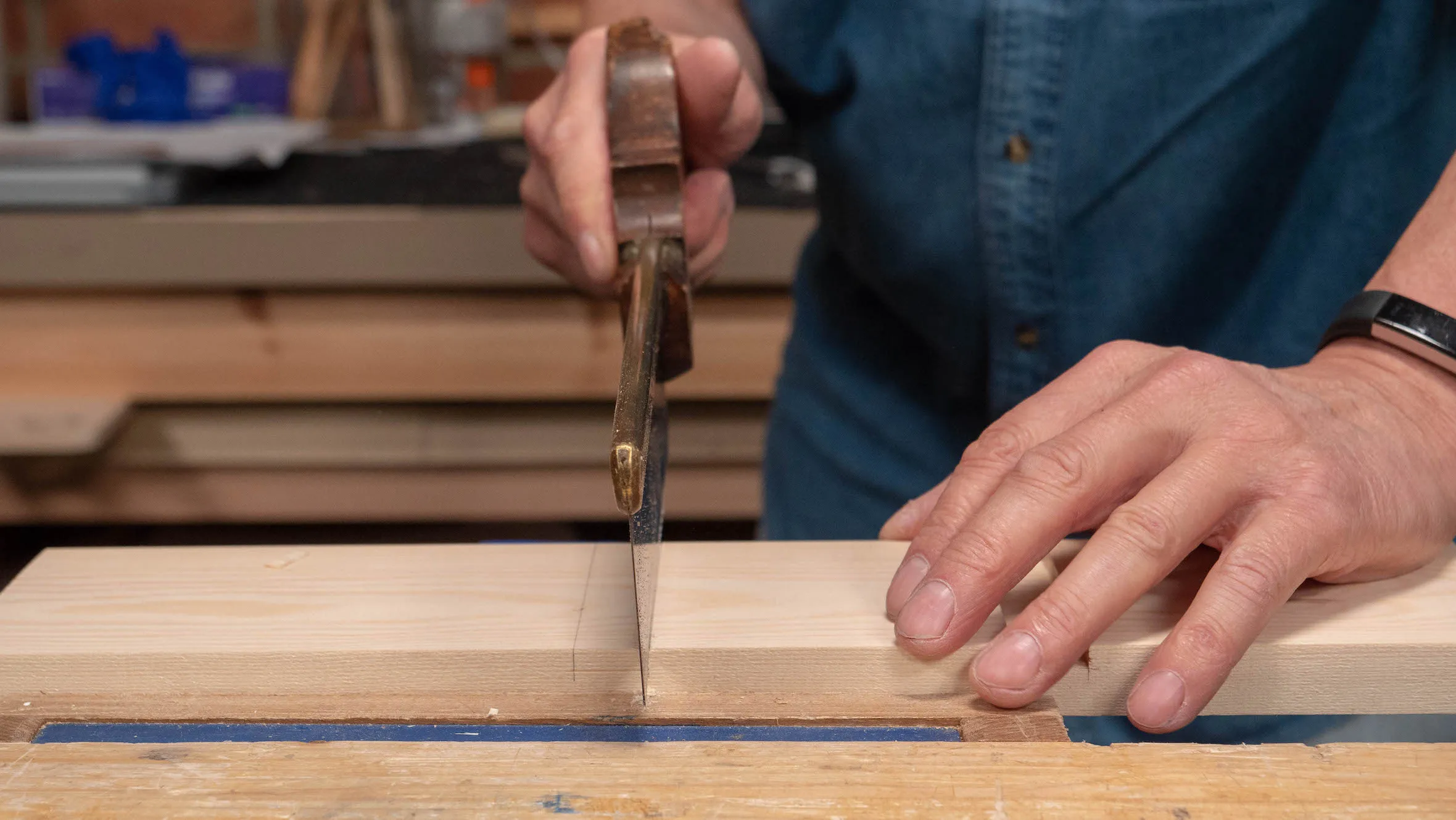 Gently begin to rub the saw teeth along the far end of the step down