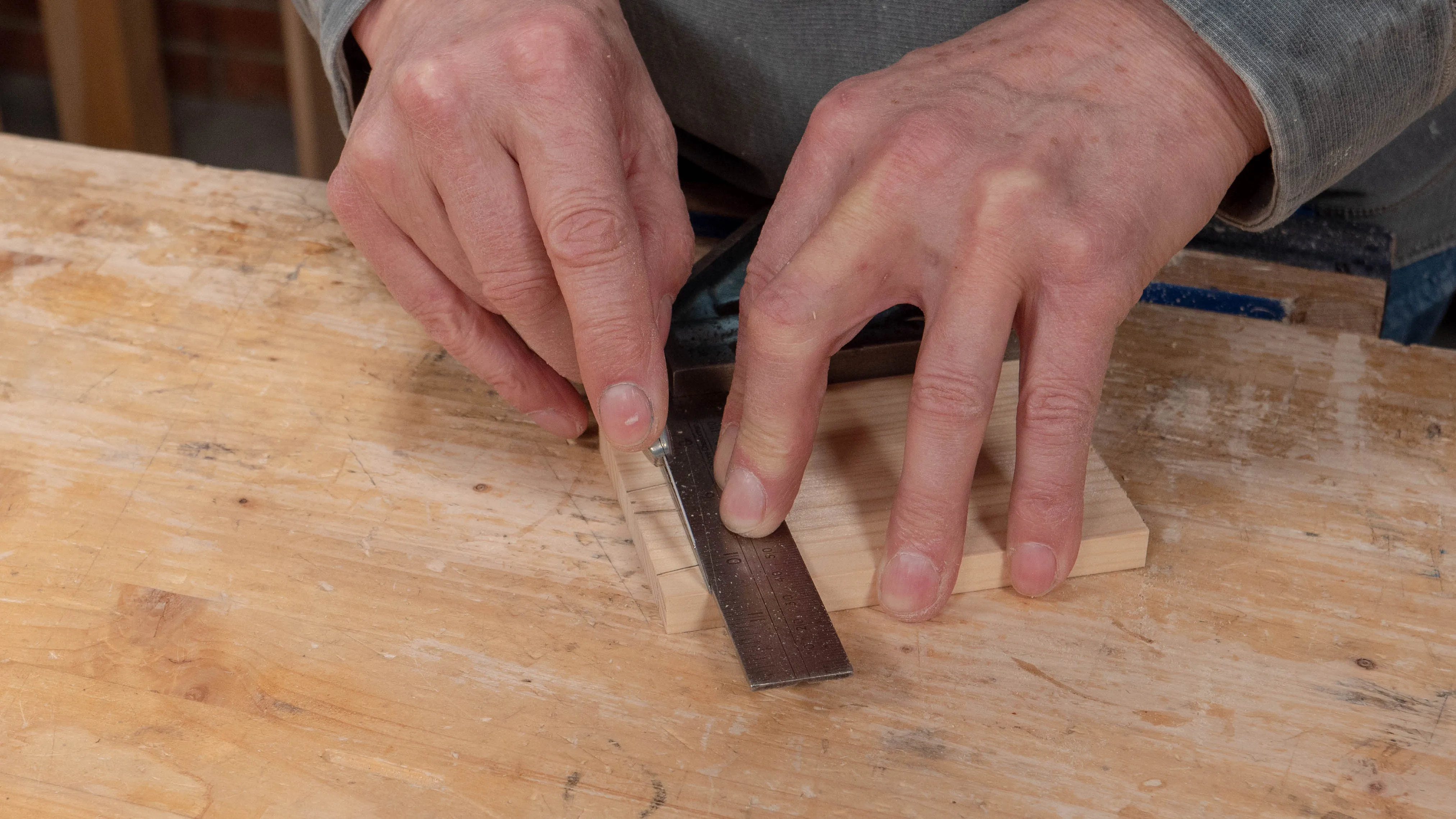 Create a knifewall on either side of and in between the tails to define the exact cut line