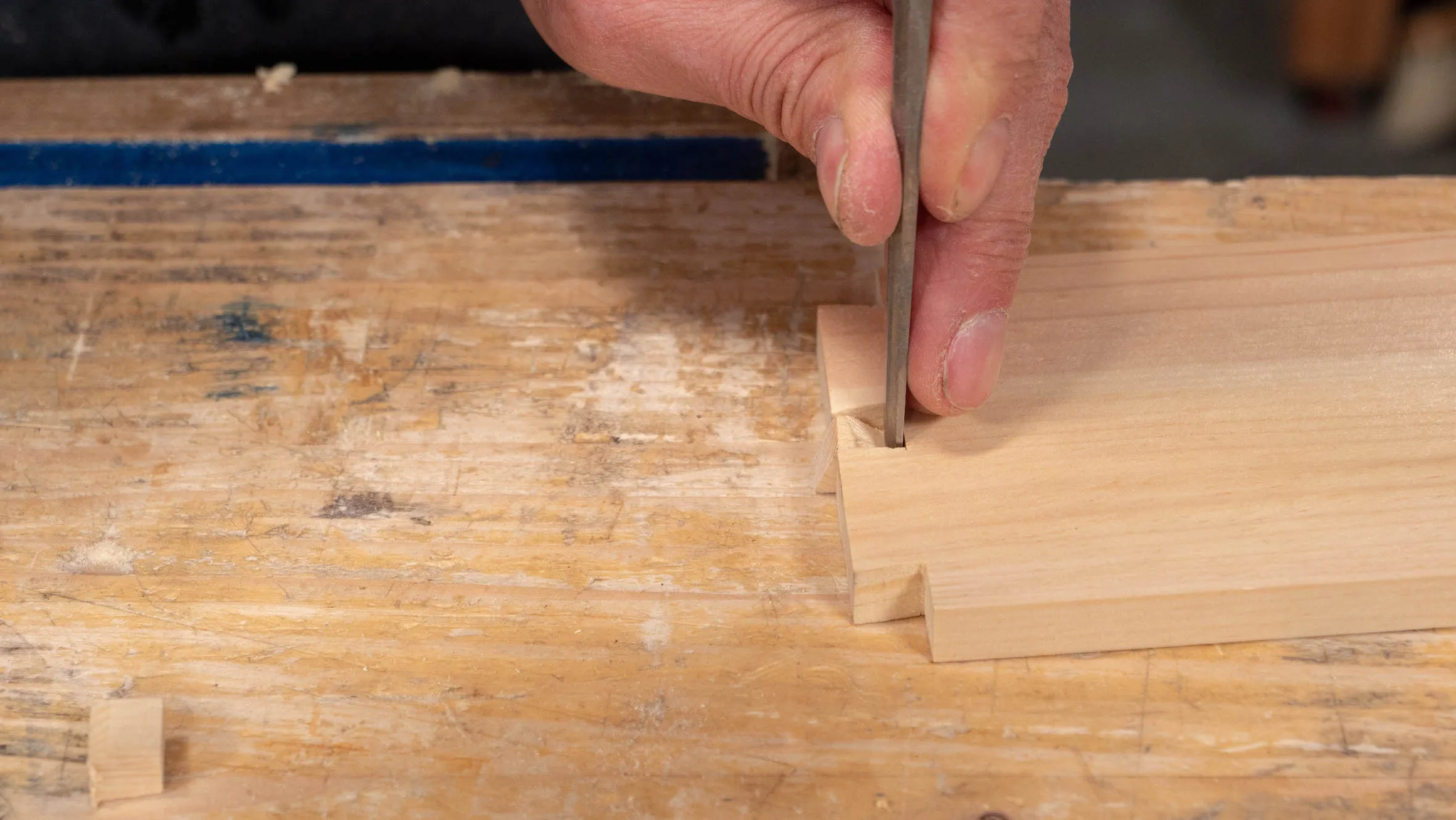 Choke up on your chisel when you are about to break through