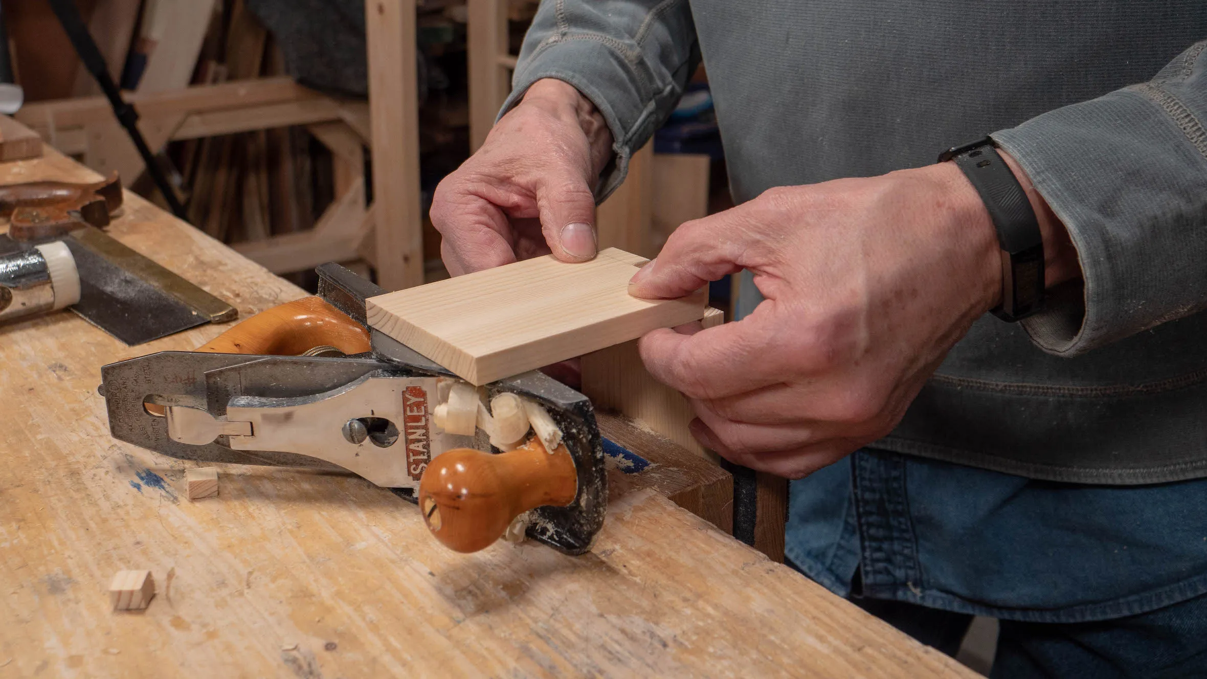 A plane on its side level with your pin piece in the vise makes a good platform for your tail piece