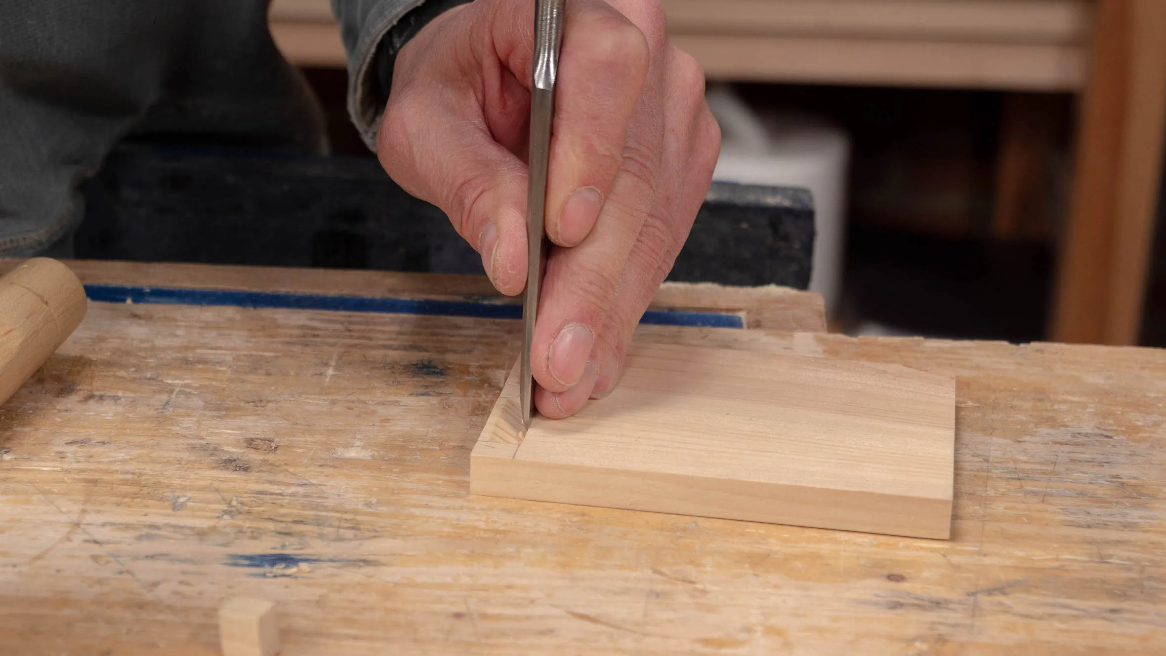 Choke up on your chisel when you are about to break through