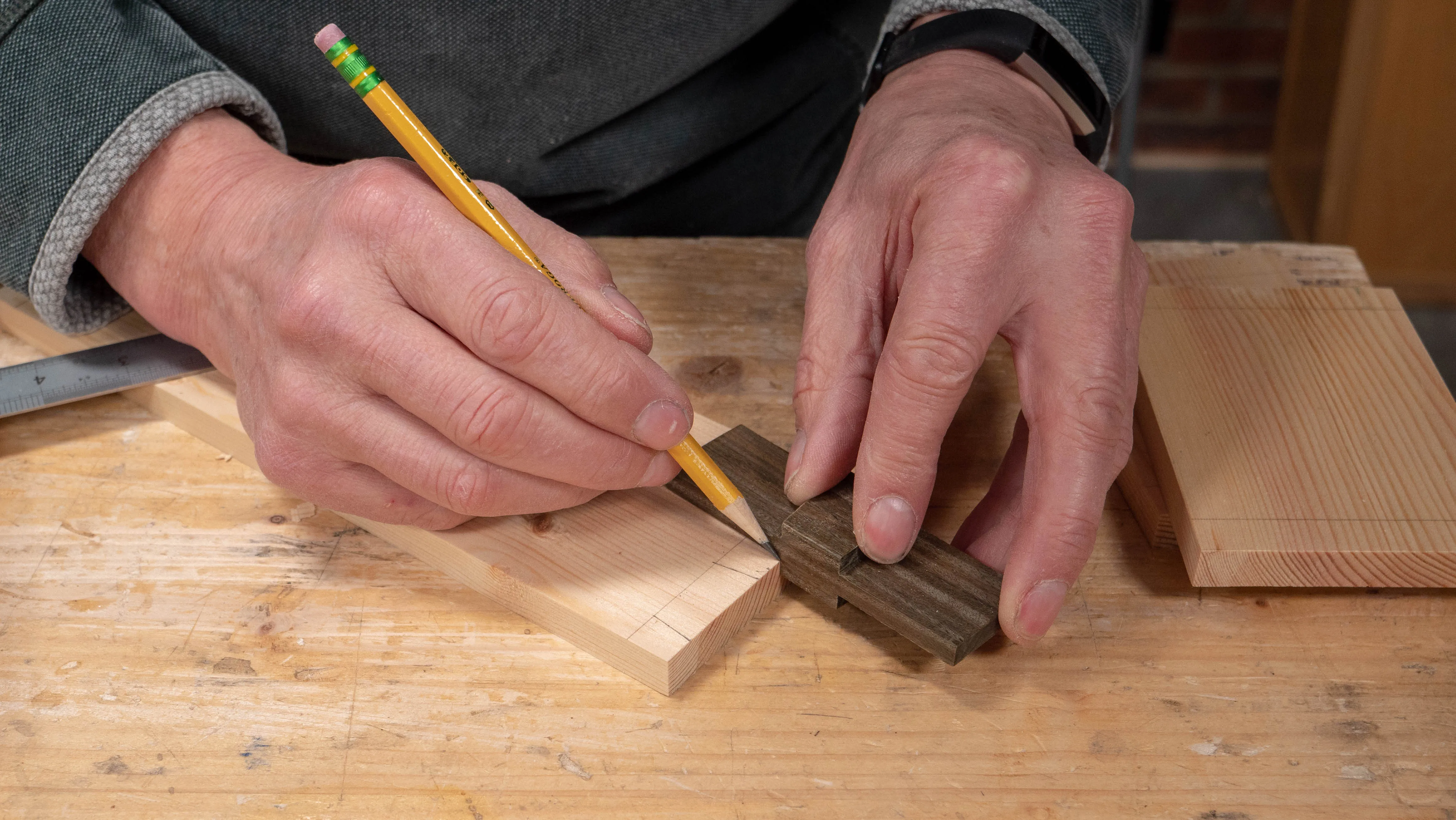 Mark the sides of the dovetails with a dovetail template