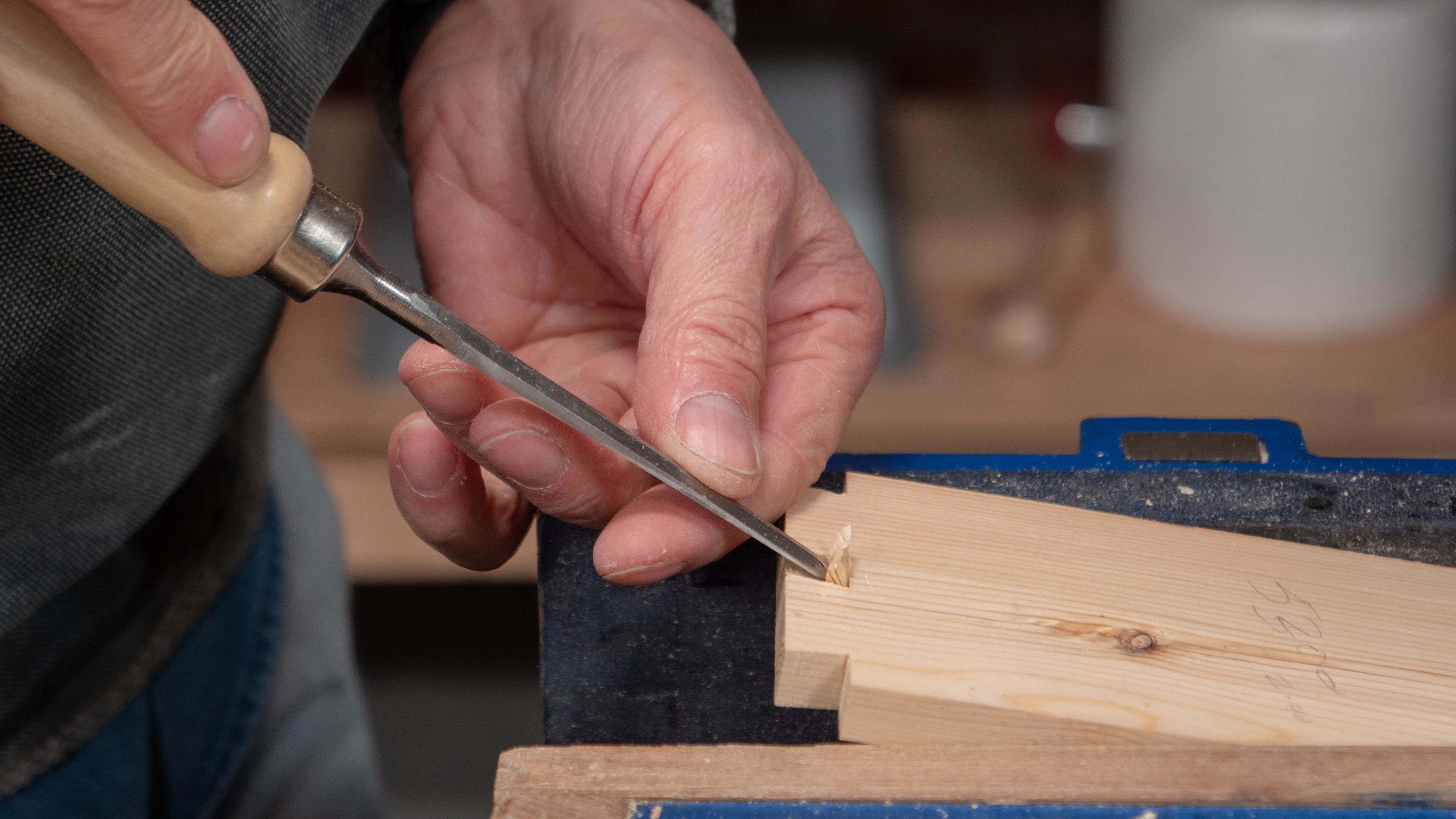 Chop and pare the middle pin recess with sharp, narrow chisels