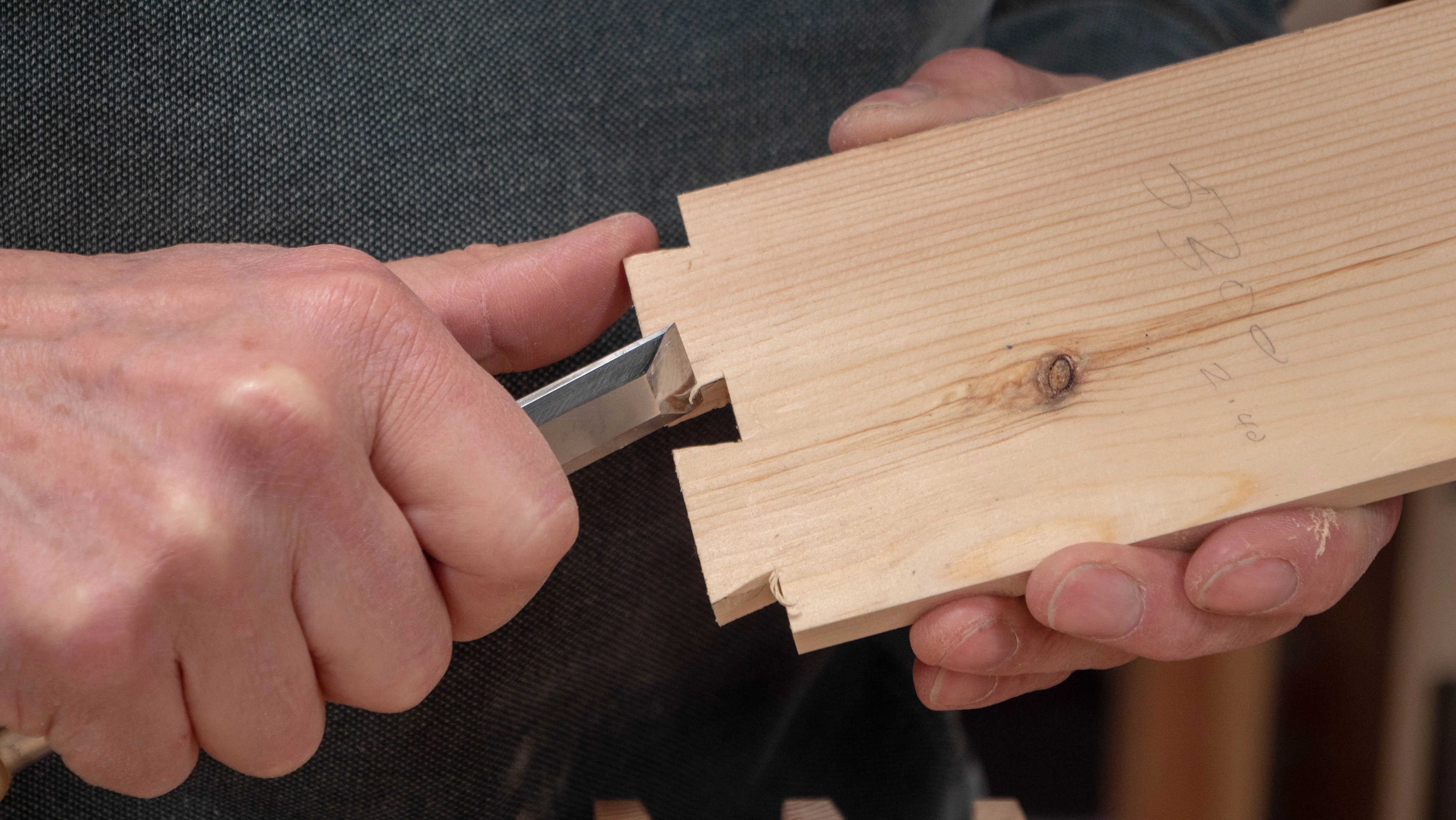 Ease the entry of the dovetails by creating a leading edge on the inside face